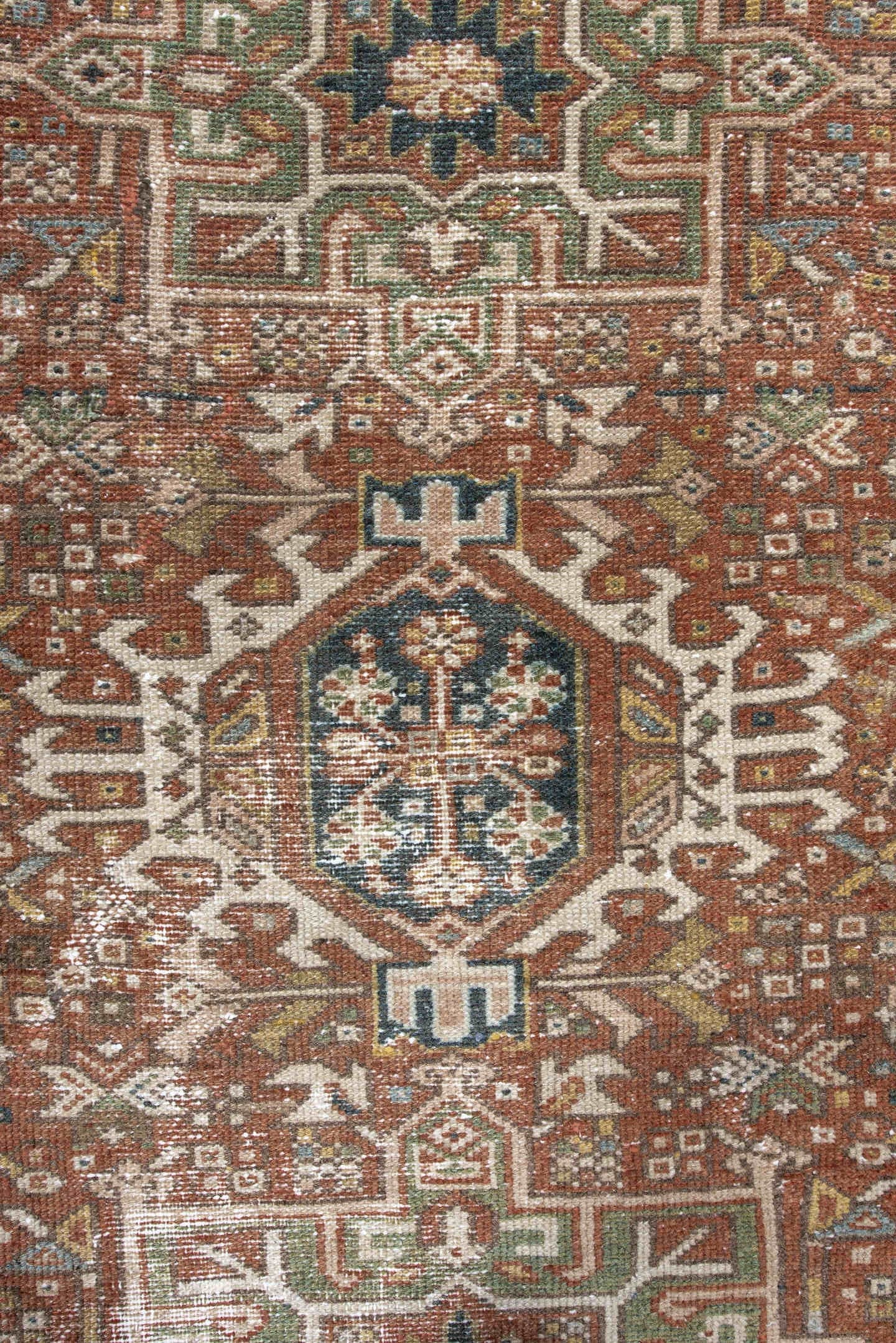 3' x 4' one-of-a-kind handmade antique Karaje small size rug. Color palette: rust, ivory, navy, sage, camel, gold