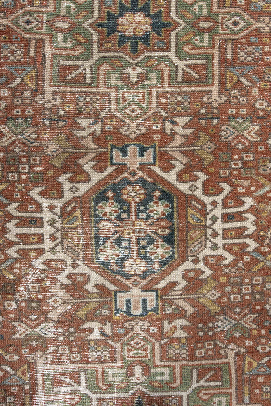 3' x 4' one-of-a-kind handmade antique Karaje small size rug. Color palette: rust, ivory, navy, sage, camel, gold