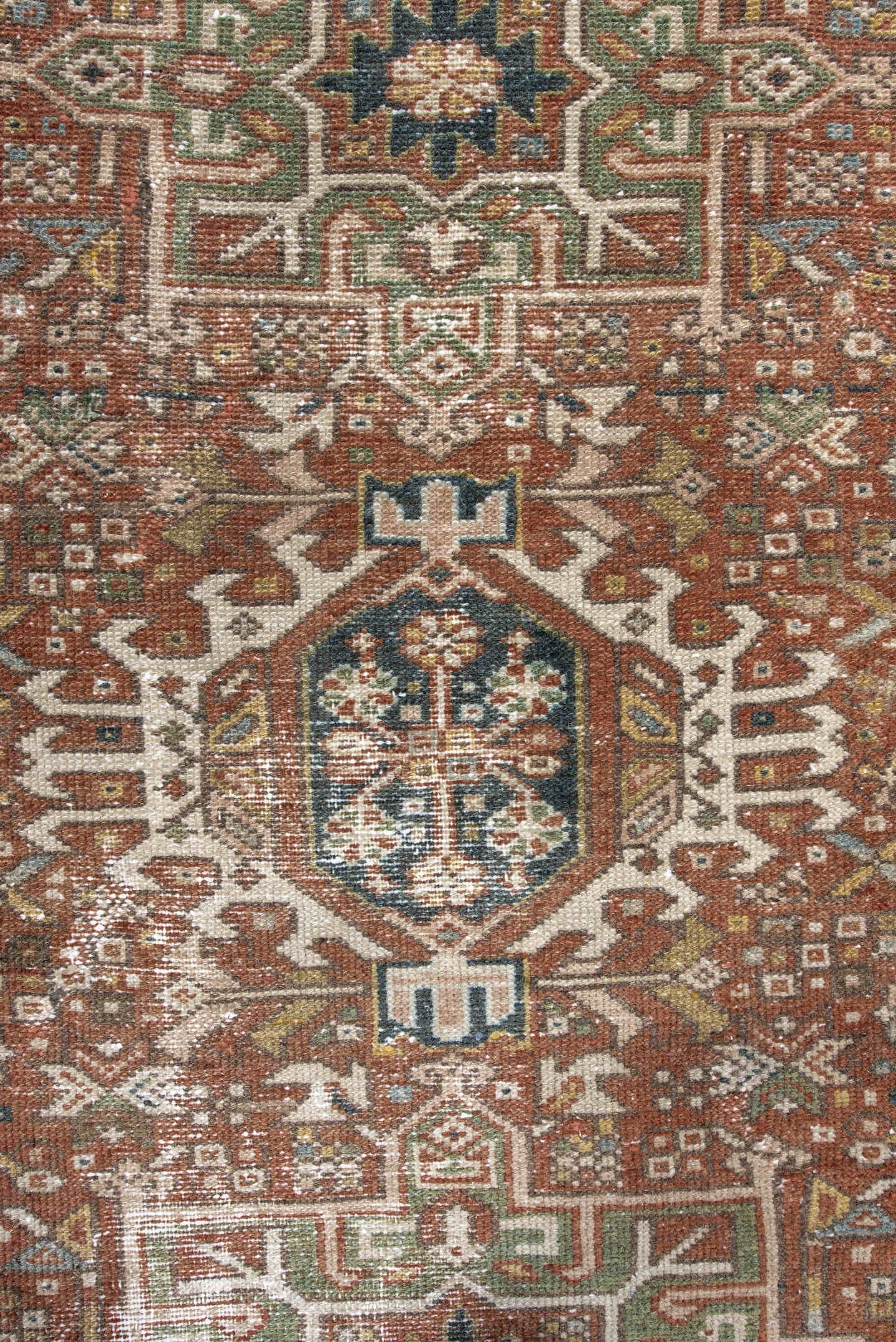 3' x 4' one-of-a-kind handmade antique Karaje small size rug. Color palette: rust, ivory, navy, sage, camel, gold