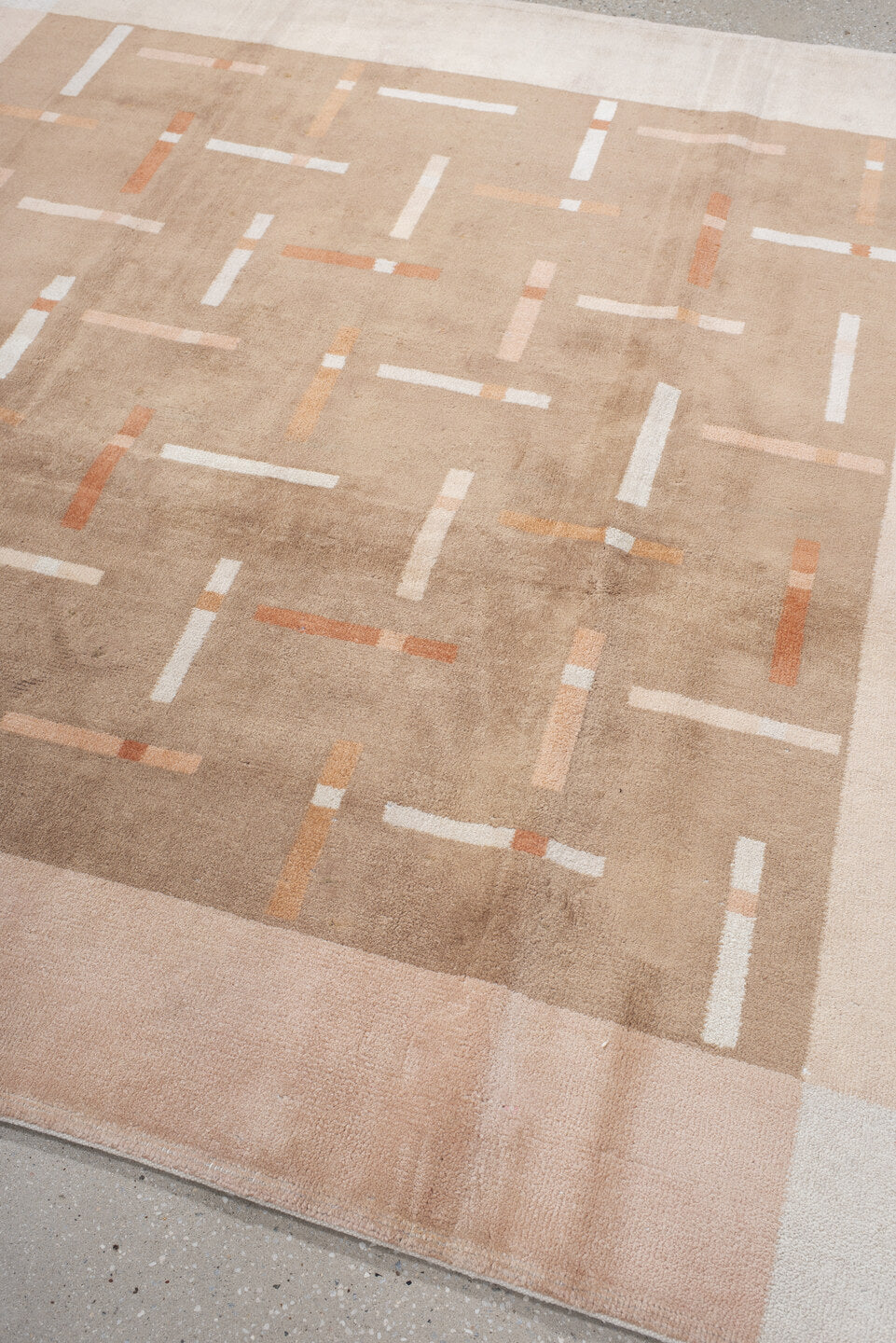 6' x 6' one-of-a-kind handmade handmade Modern rug. Color palette: taupe, ivory, blush, coral, beige, gray, pink, terracotta