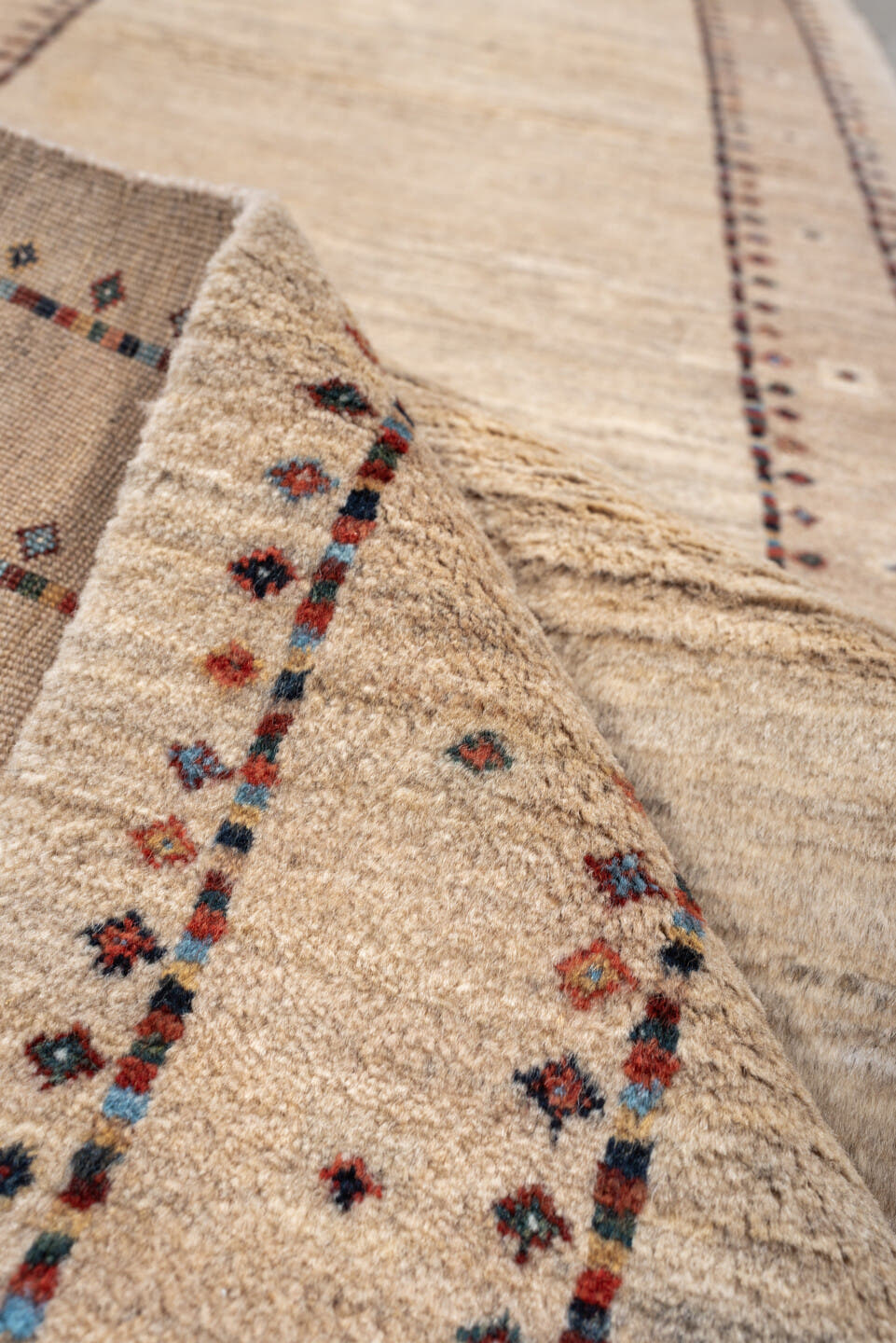 2' x 8' one-of-a-kind handmade vintage Gabbe runner rug. Color palette: ivory, cream, taupe, rust, navy, blue gray, beige