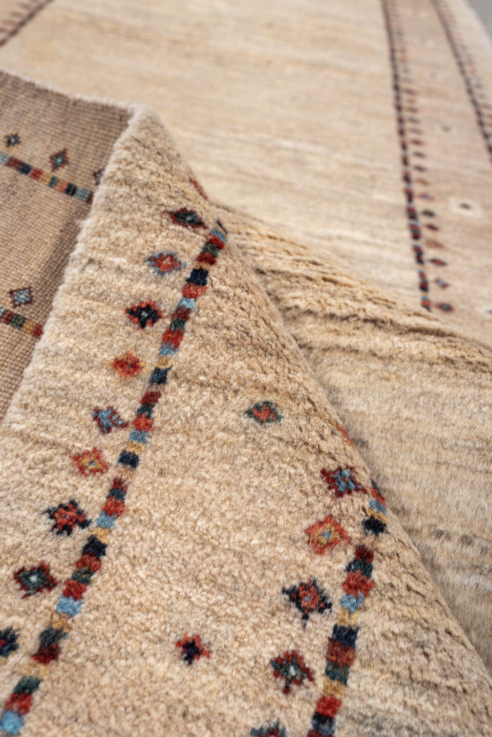 2' x 8' one-of-a-kind handmade vintage Gabbe runner rug. Color palette: ivory, cream, taupe, rust, navy, blue gray, beige