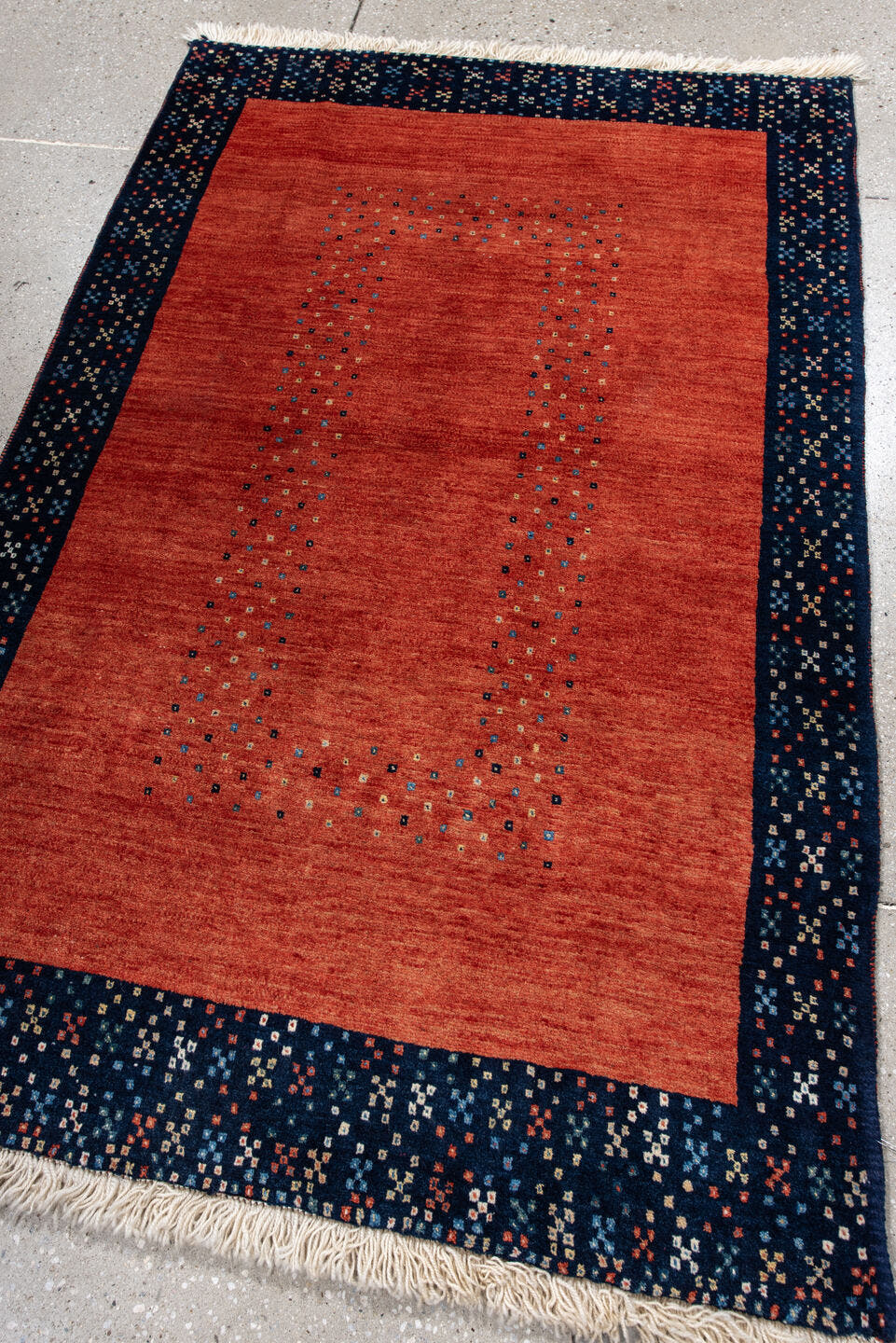 3' x 5' one-of-a-kind handmade vintage Gabbe small size rug. Color palette: terra cotta, navy, ivory, sky blue, rust