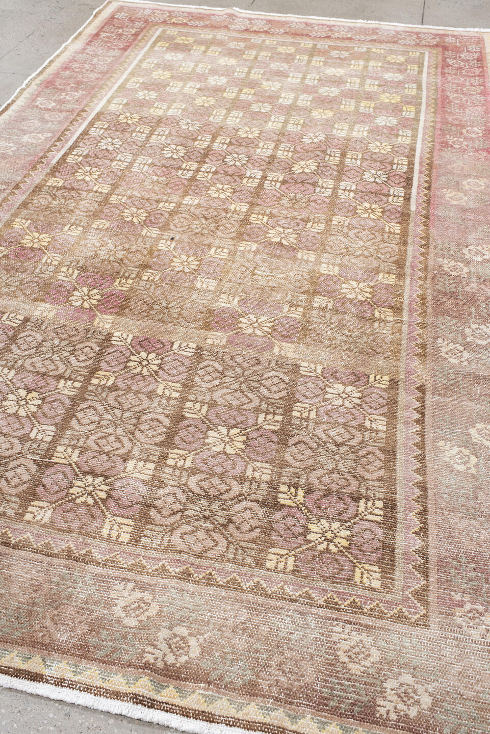 6' x 11' one-of-a-kind handmade vintage European large size rug. Color palette: brown, red, off-white, pink, gray, orange