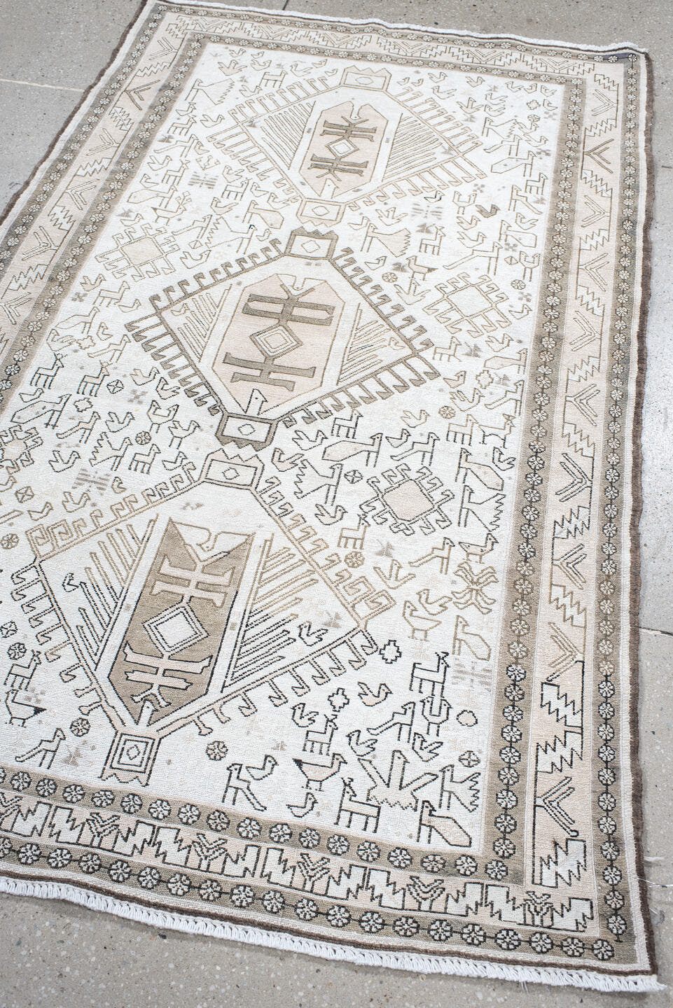 3' x 5' one-of-a-kind handmade antique Sumak small size rug. Color palette: ivory, taupe, brown, camel, gray, beige