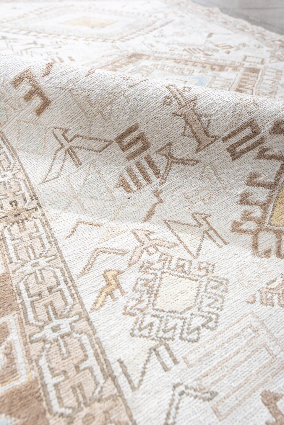 4' x 5' one-of-a-kind handmade antique Sumak small size rug. Color palette: ivory, camel, taupe, pale blue, soft gold, beige