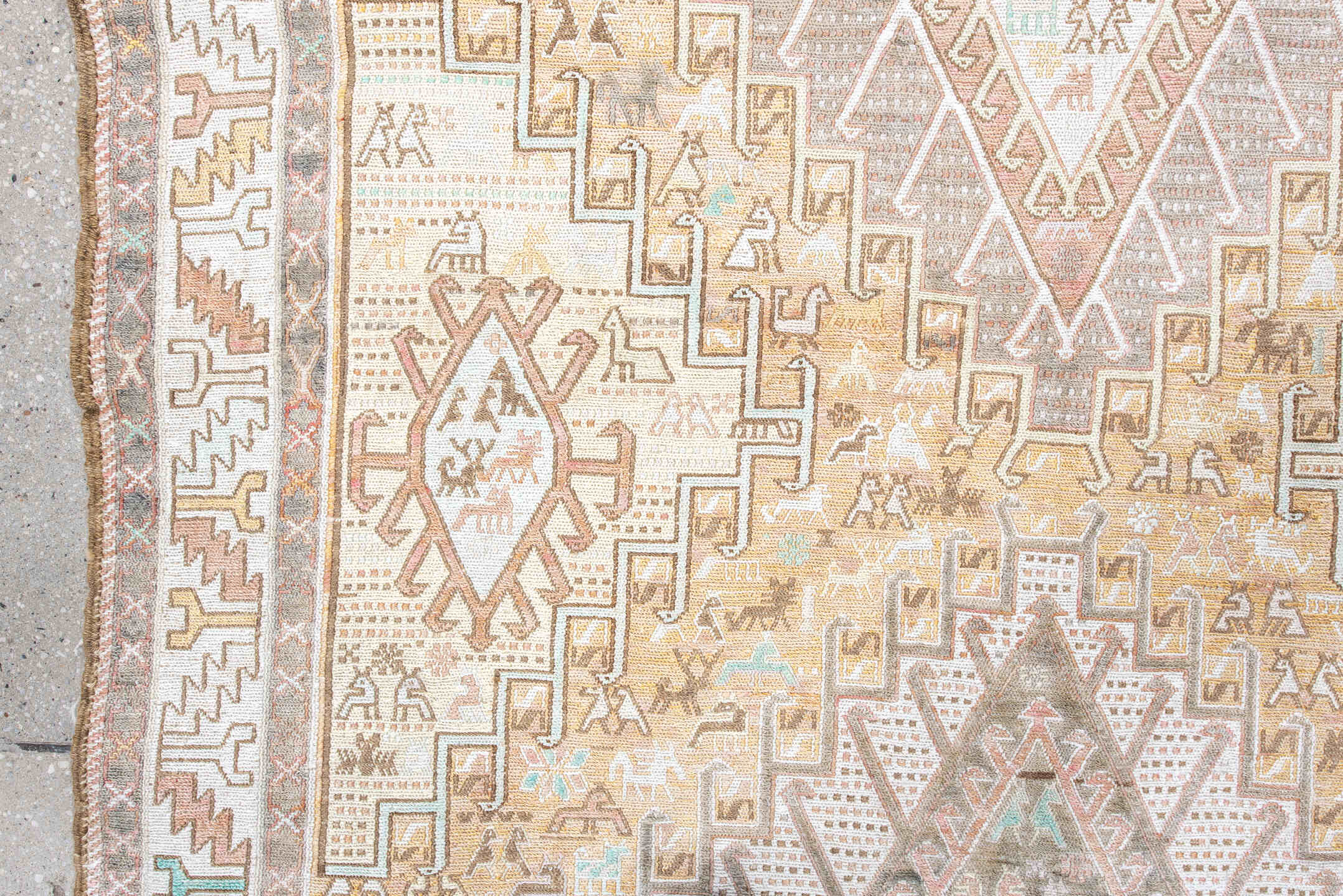 3' x 6' one-of-a-kind handmade antique Sumak small size rug. Color palette: ivory, taupe, sand, blush, pale aqua, camel