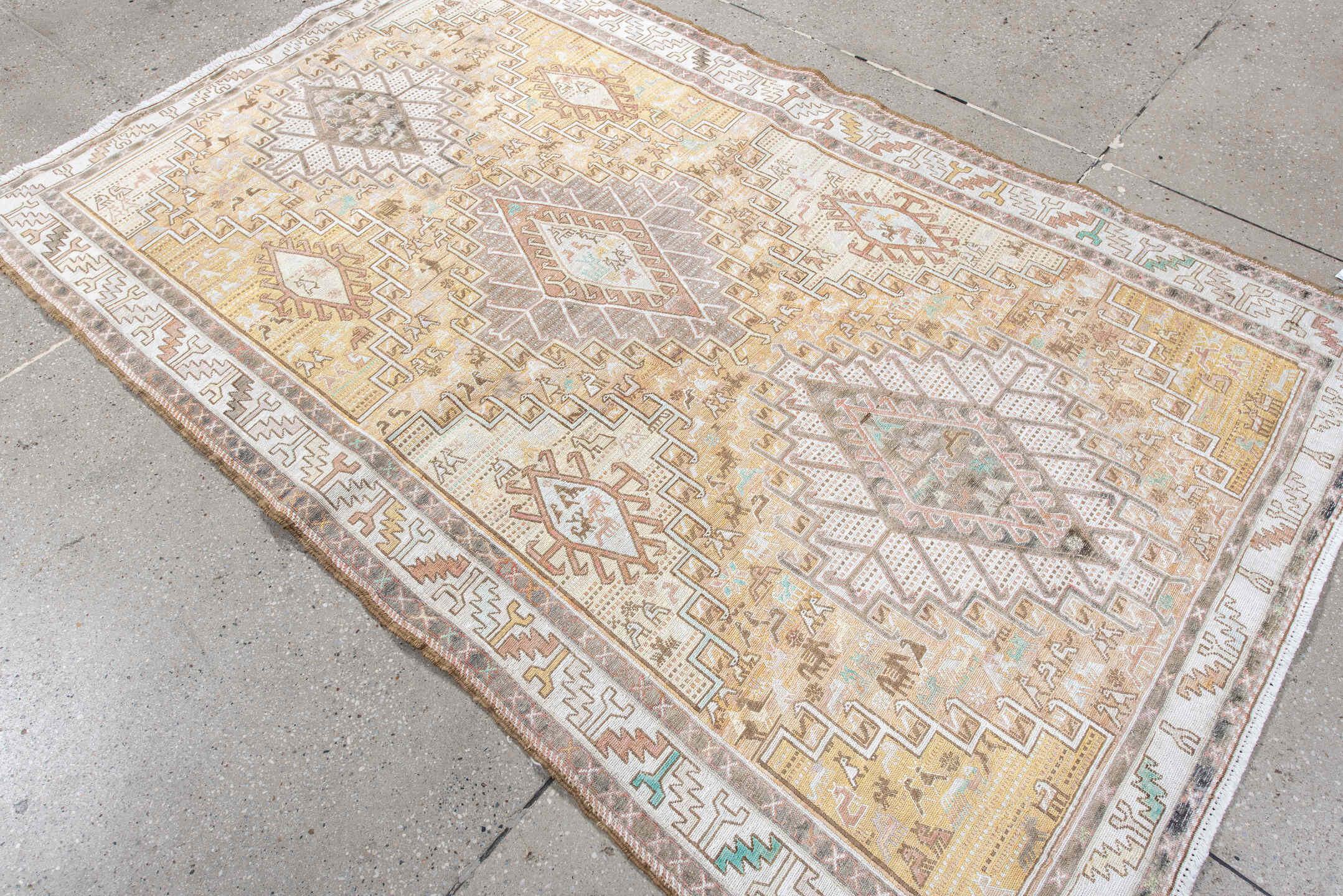 3' x 6' one-of-a-kind handmade antique Sumak small size rug. Color palette: ivory, taupe, sand, blush, pale aqua, camel