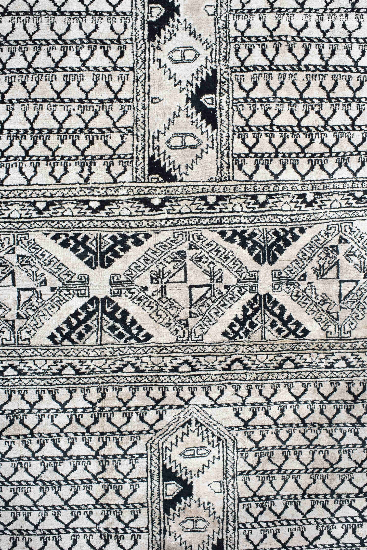 3' x 5' one-of-a-kind handmade vintage Afghan small size rug. Color palette: ivory, charcoal, black, gray