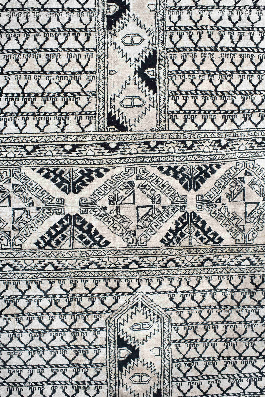 3' x 5' one-of-a-kind handmade vintage Afghan small size rug. Color palette: ivory, charcoal, black, gray