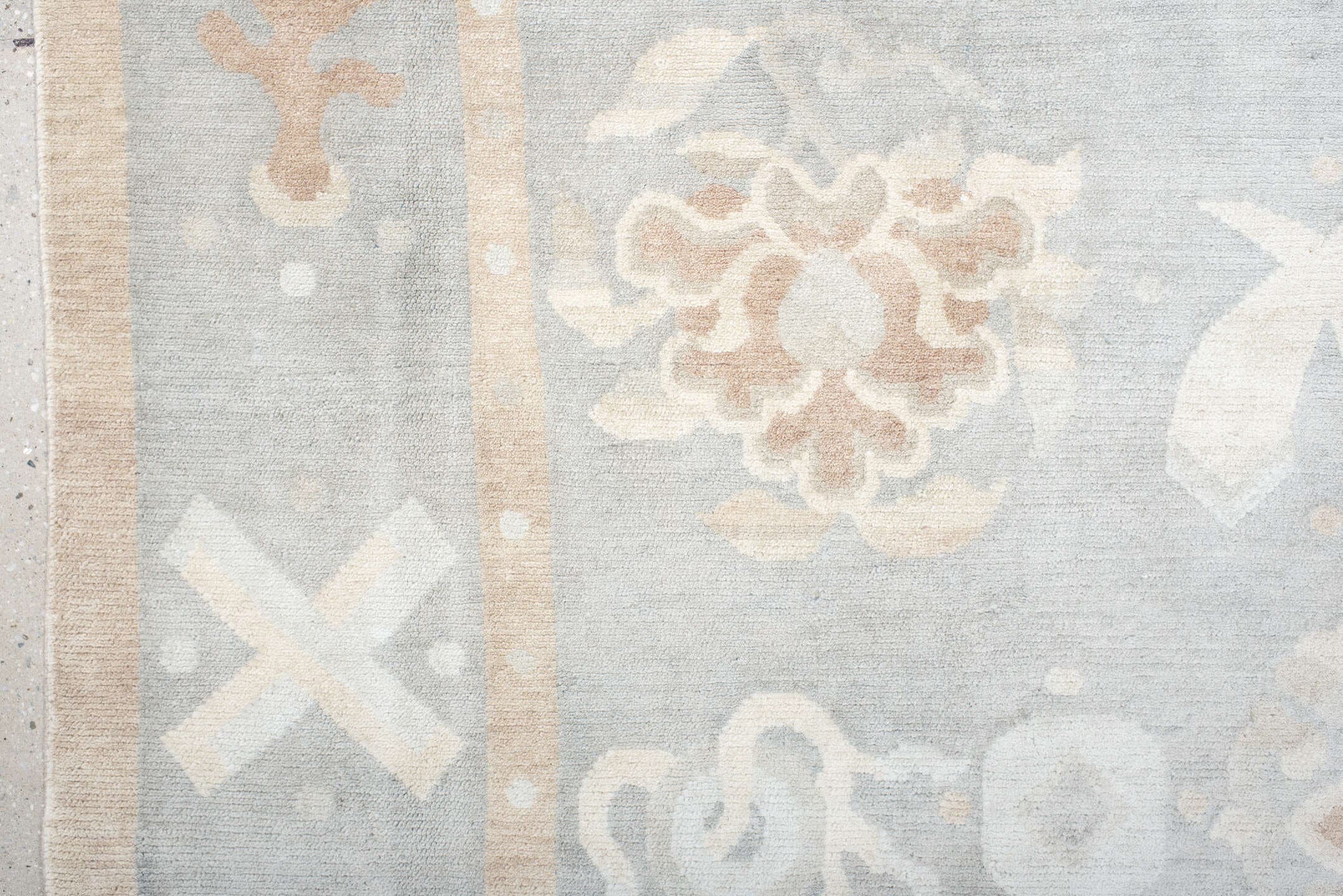 6' x 7' one-of-a-kind handmade antique Tibetan rug. Color palette: pale blue, ivory, blush, sand, taupe, light blue, pink
