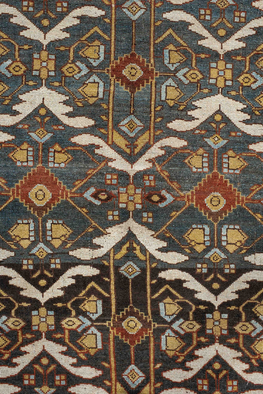 5' x 14' one-of-a-kind handmade antique Baktiary rug. Color palette: brown, ivory, camel, slate, rust, gold, charcoal