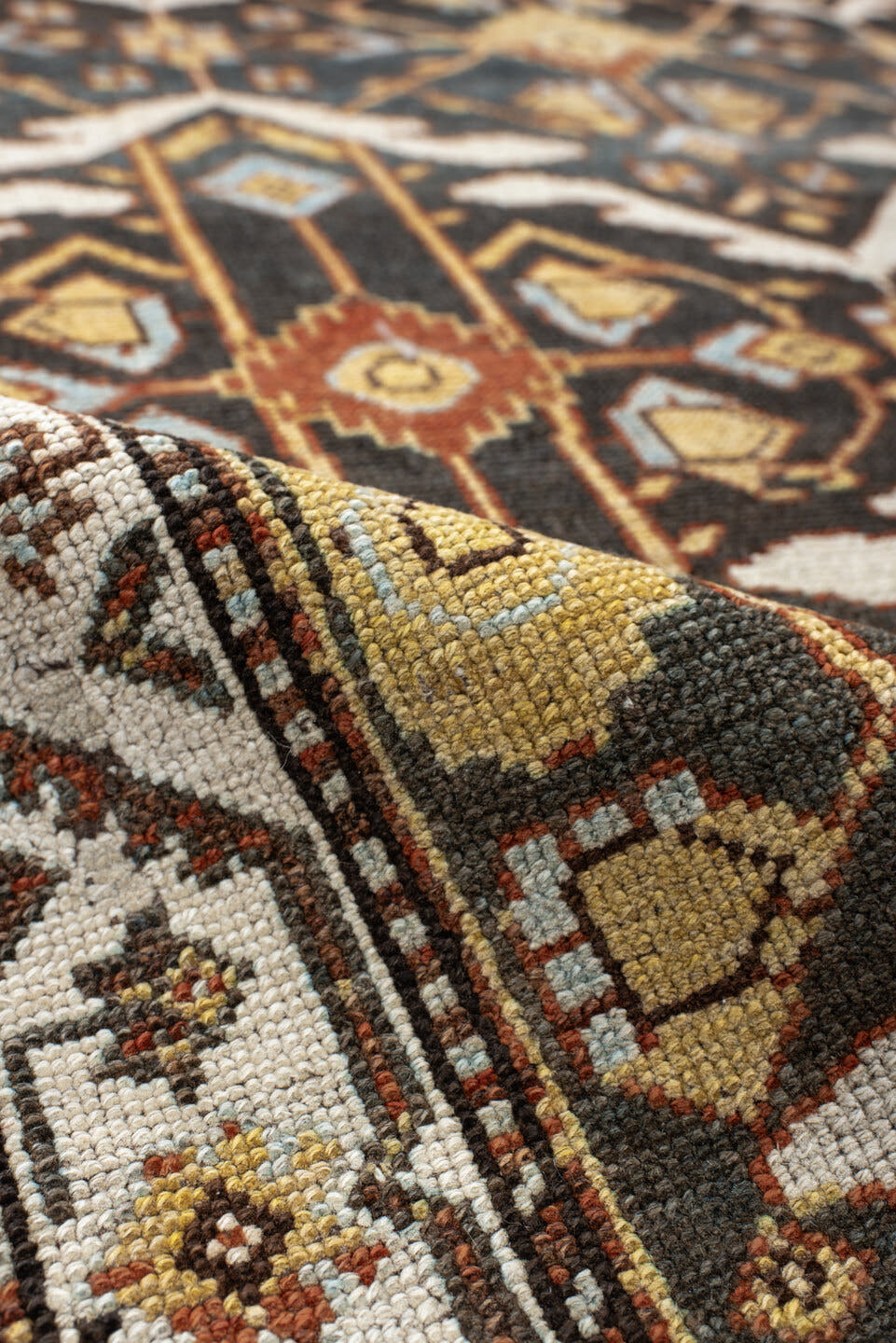 5' x 14' one-of-a-kind handmade antique Baktiary rug. Color palette: brown, ivory, camel, slate, rust, gold, charcoal