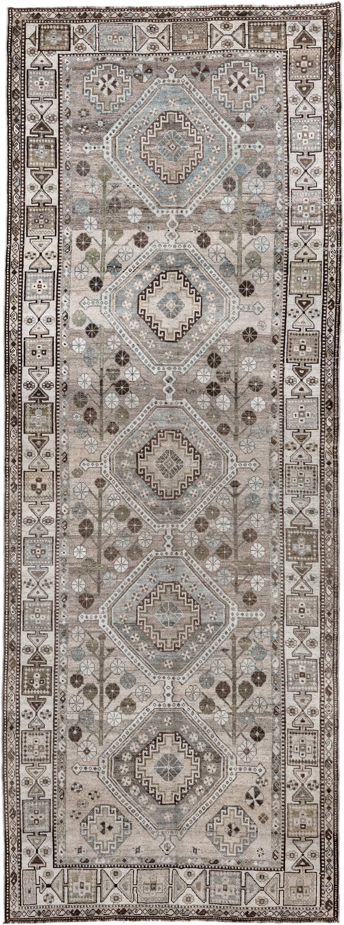5' x 14' one-of-a-kind handmade antique Shiraz rug. Color palette: taupe, ivory, brown, slate, camel, charcoal, sage, beige