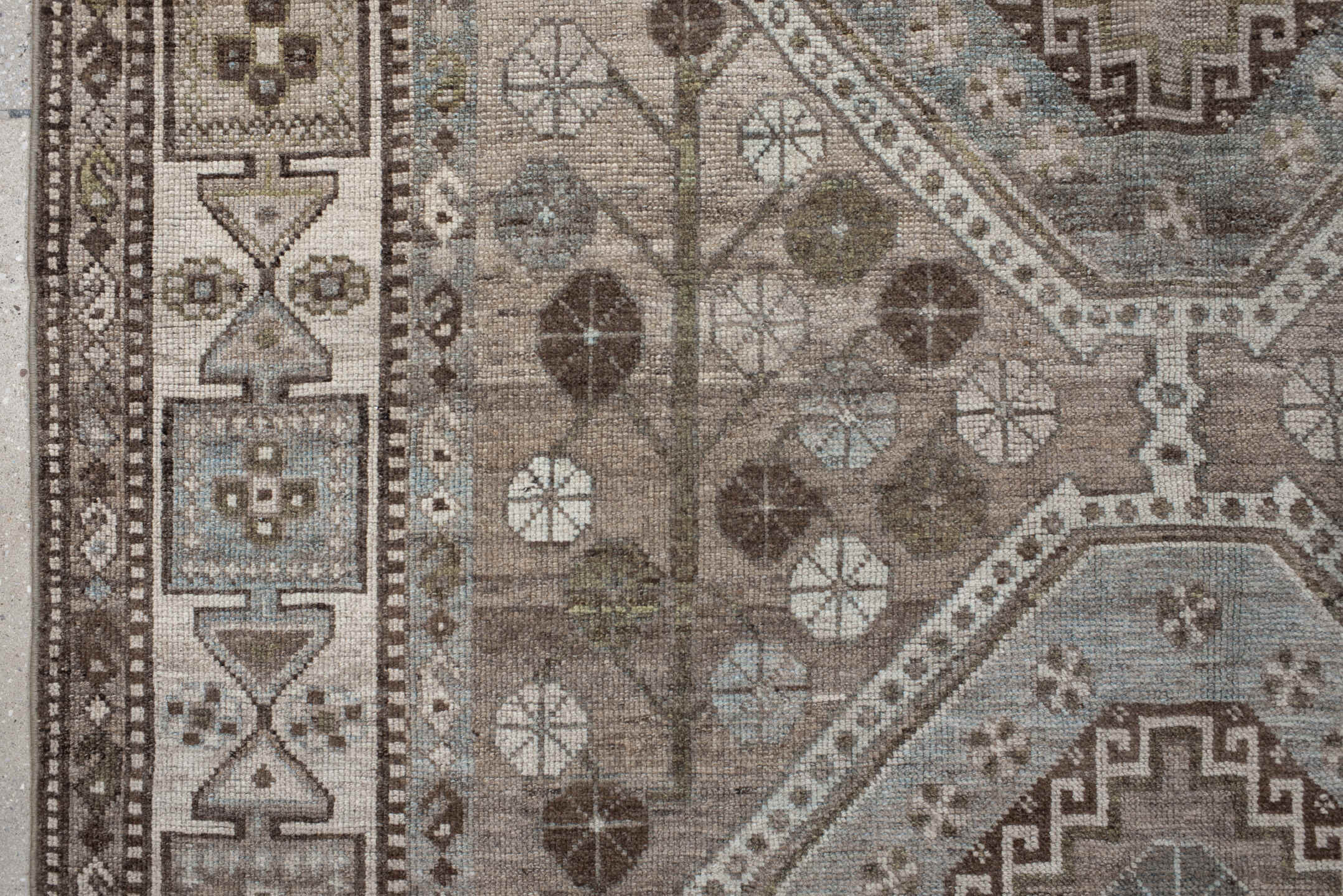 5' x 14' one-of-a-kind handmade antique Shiraz rug. Color palette: taupe, ivory, brown, slate, camel, charcoal, sage, beige