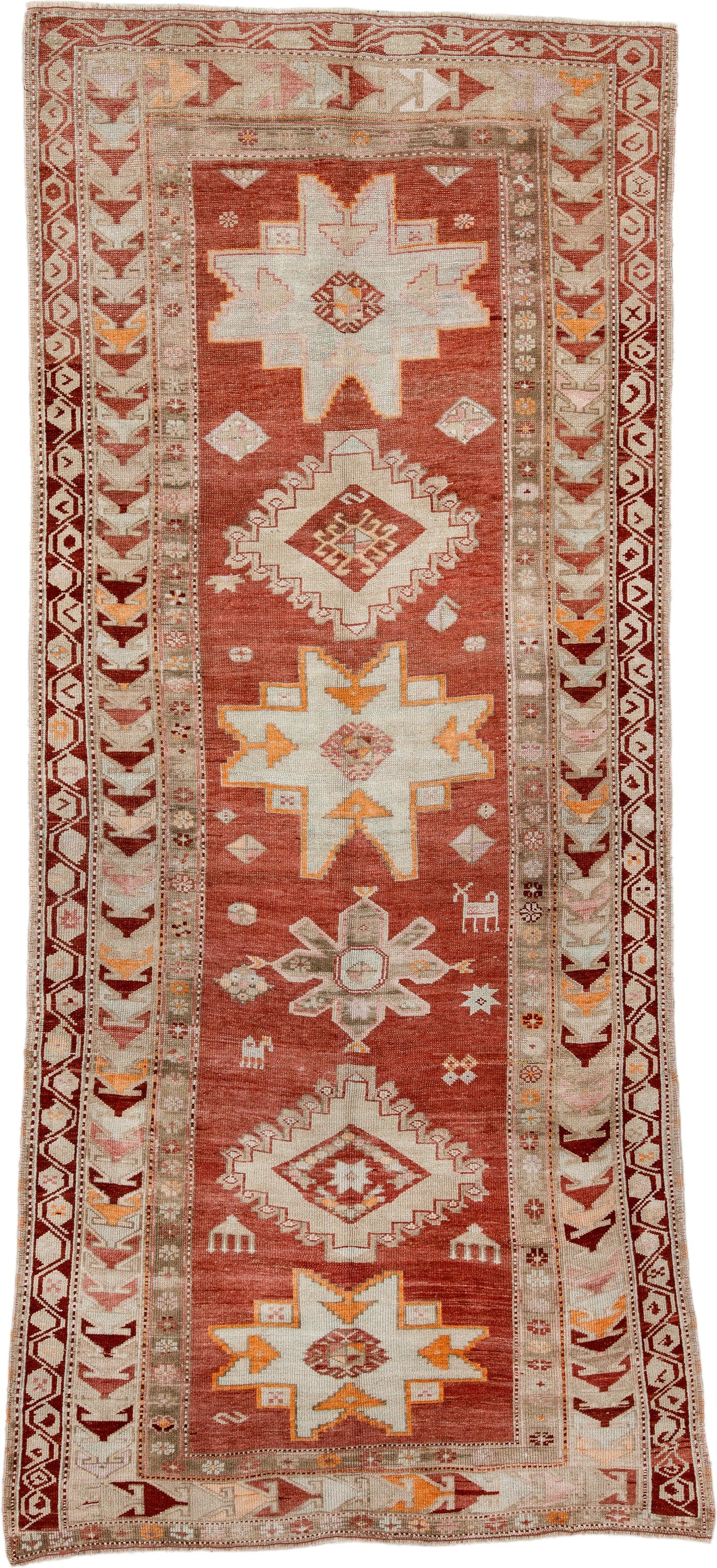 4' x 10' one-of-a-kind handmade antique Karabagh runner rug. Color palette: terra cotta, ivory, rust, beige, camel, saffron