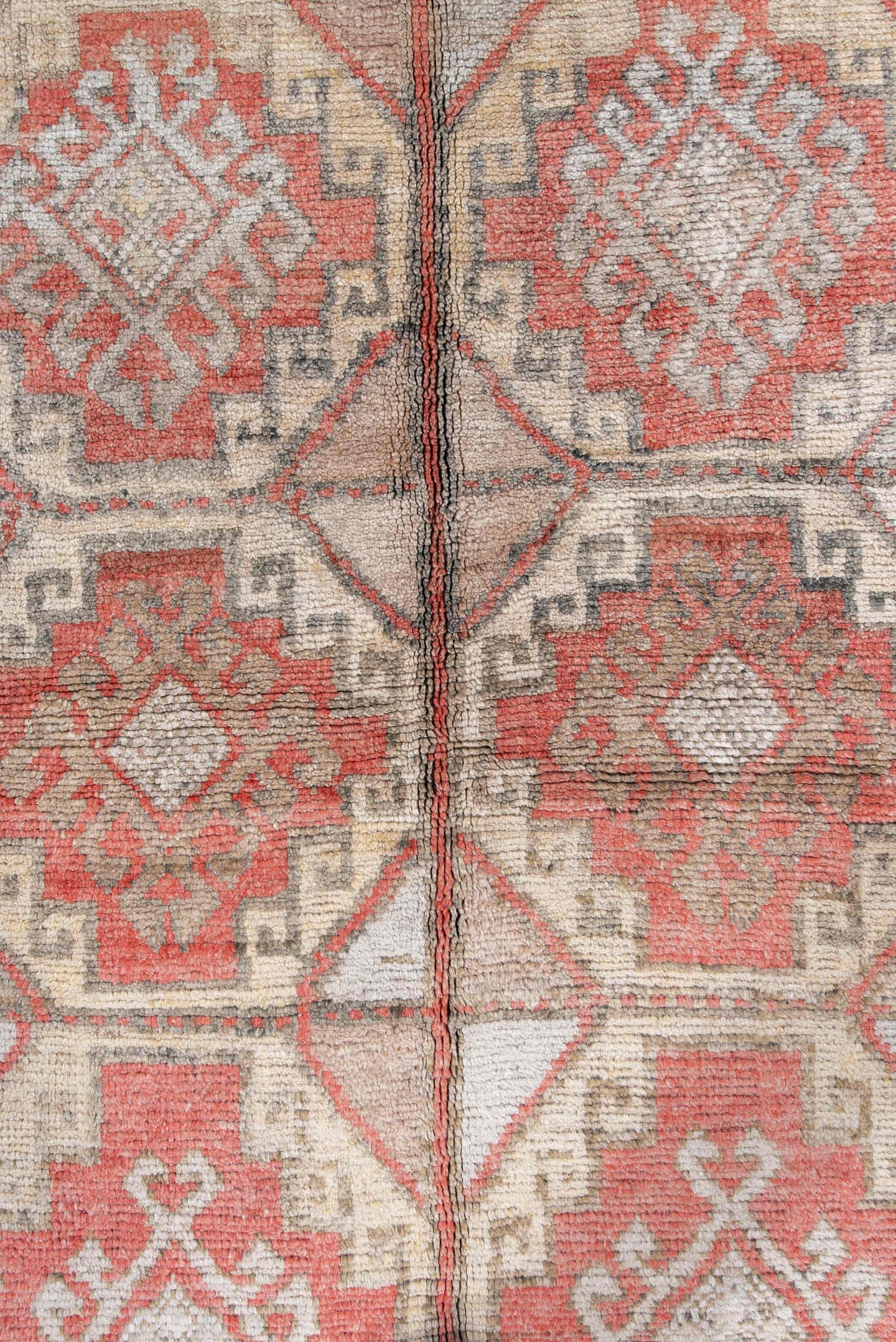 4' x 7' one-of-a-kind handmade antique Anatolian rug. Color palette: ivory, camel, coral, taupe, faded red, light gray