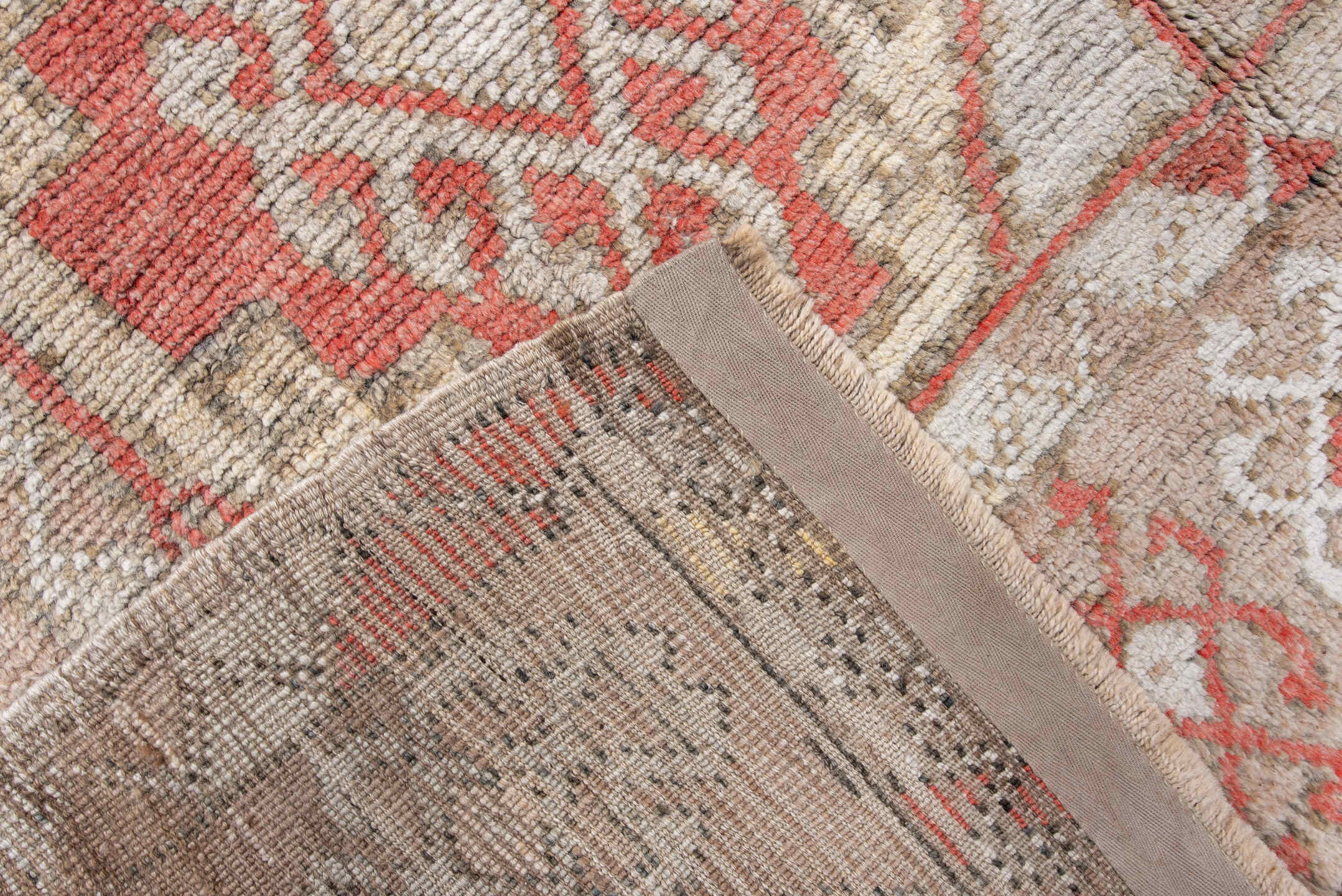 4' x 7' one-of-a-kind handmade vintage Anatol rug. Color palette: brown, gray, light gray, off-white, pink, red, silver