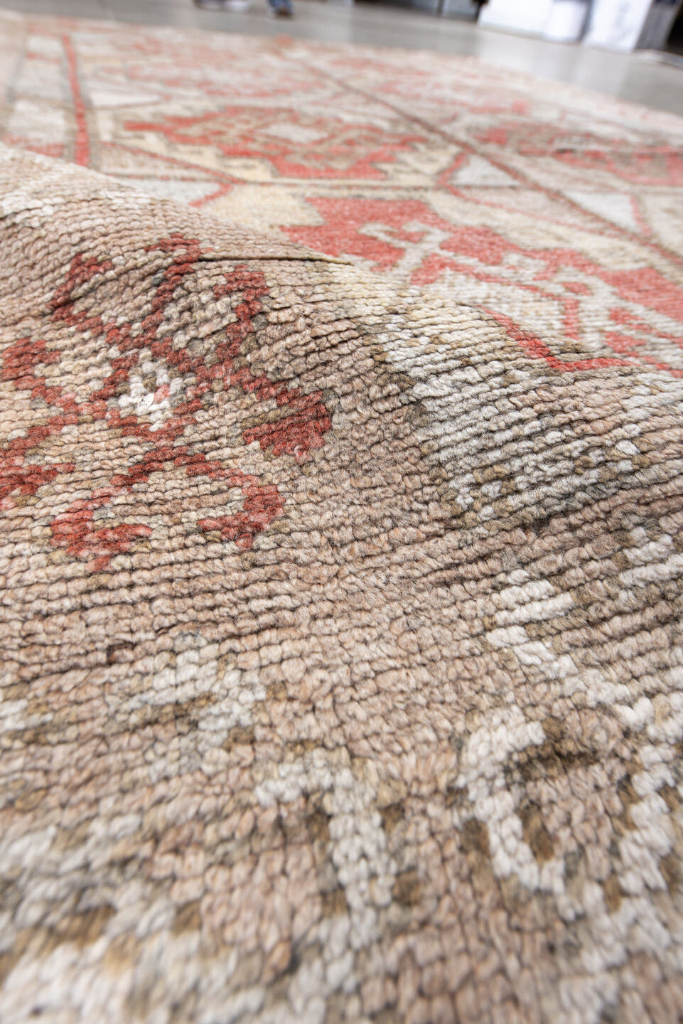 4' x 7' one-of-a-kind handmade antique Anatolian rug. Color palette: ivory, camel, coral, taupe, faded red, light gray