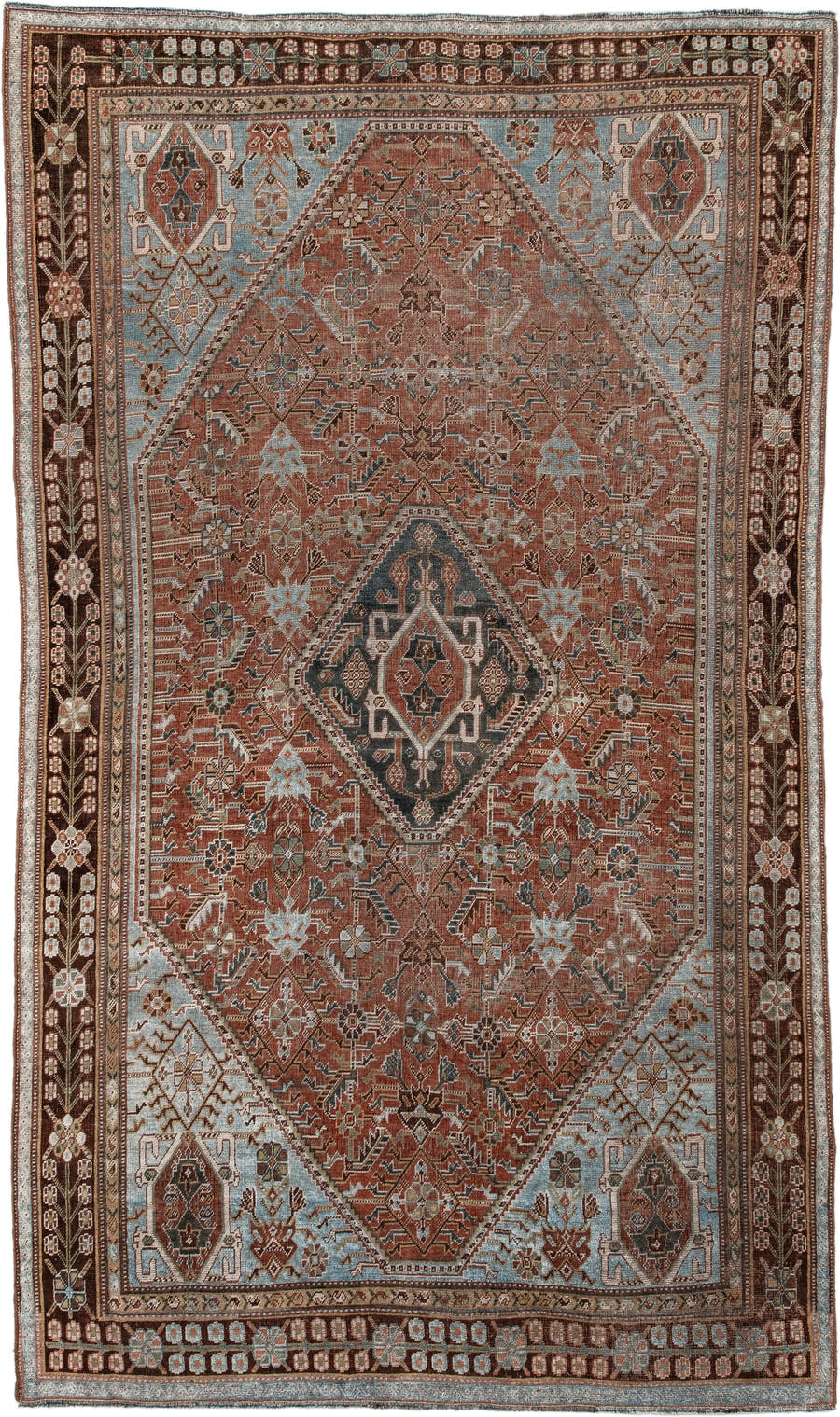 4' x 7' one-of-a-kind handmade vintage Qashqai rug. Color palette: terra cotta, pale blue, ivory, dark brown, slate, taupe