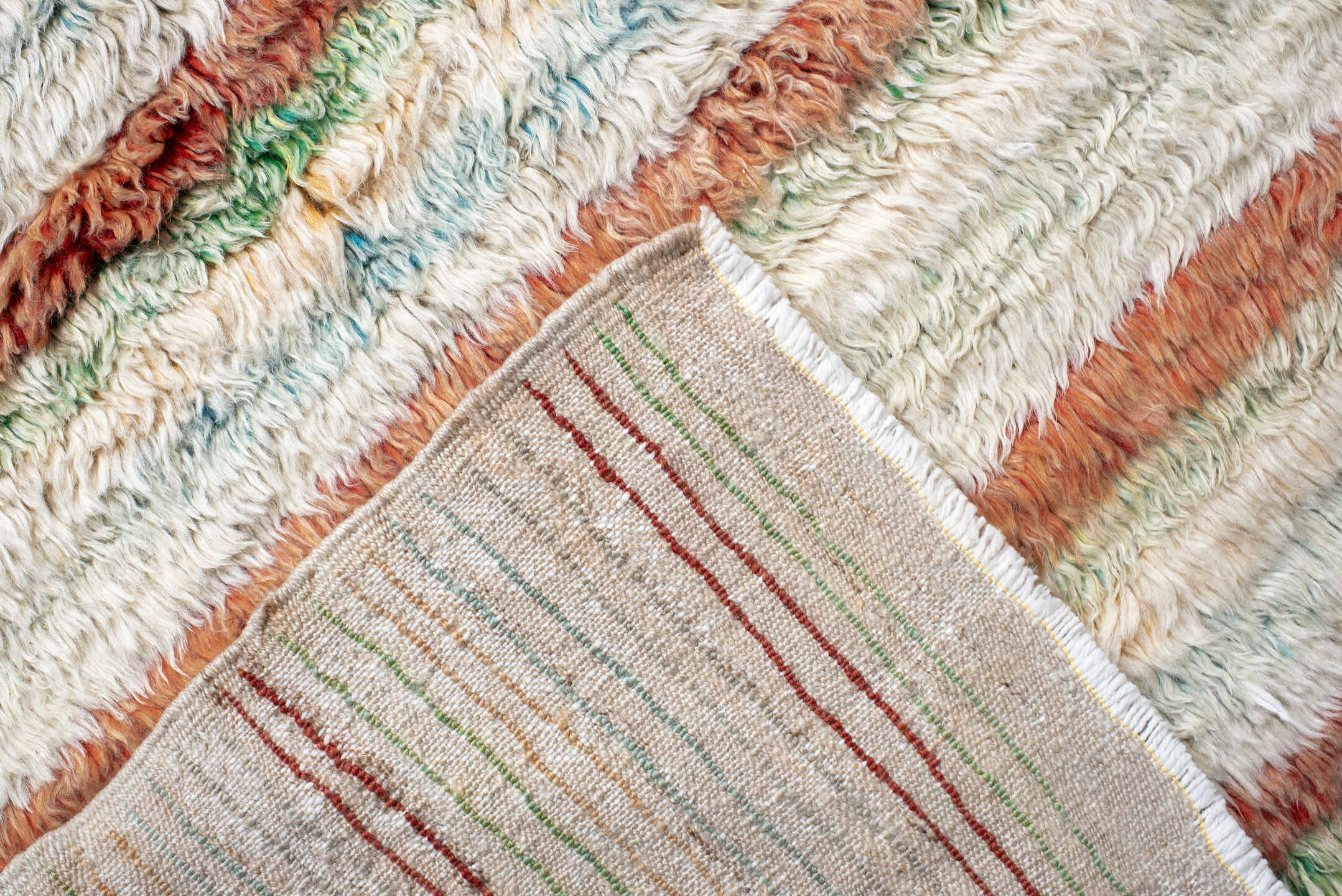 5' x 7' one-of-a-kind handmade vintage Moroccan rug. Color palette: ivory, coral, aqua, saffron, green, rust, terracotta