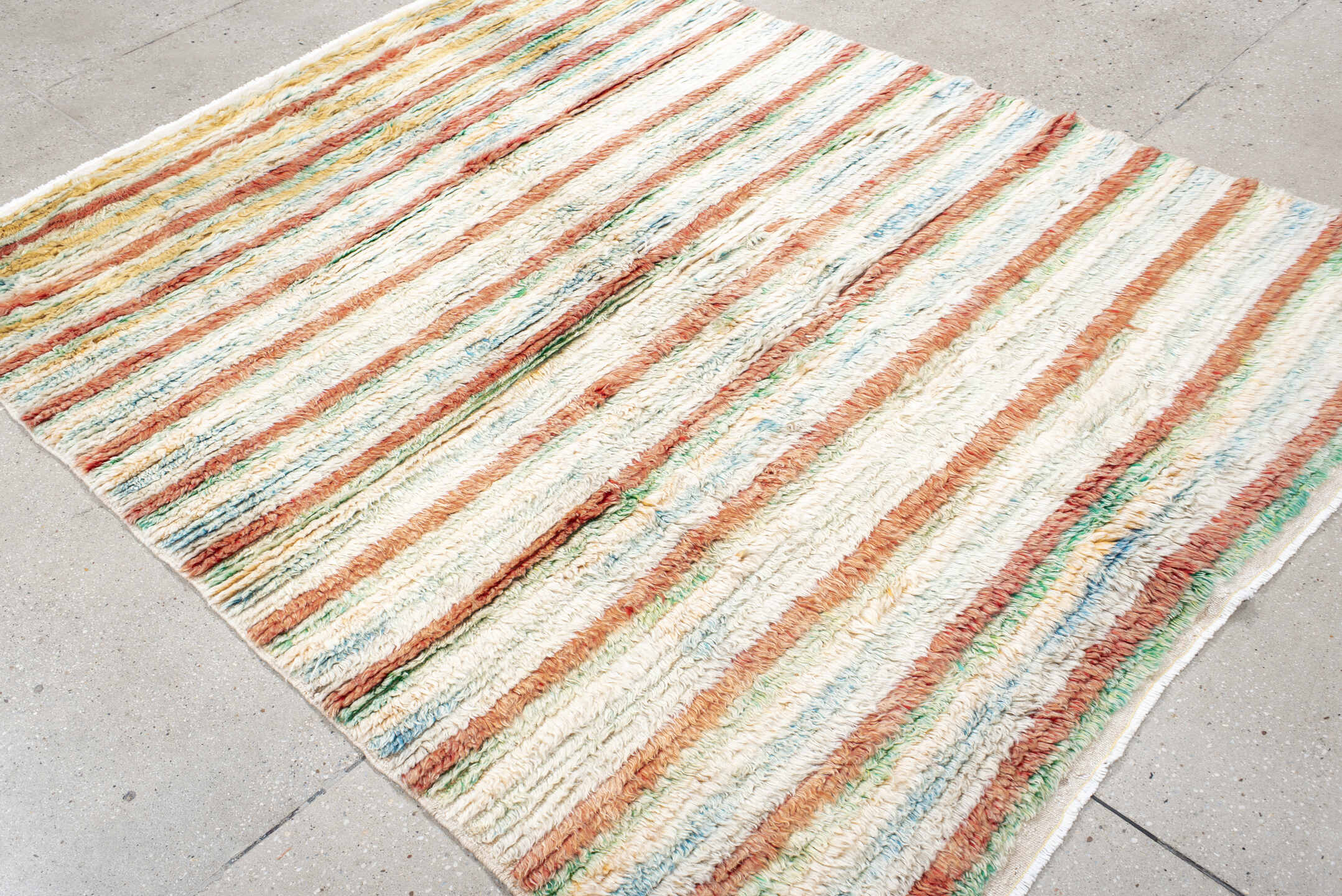 5' x 7' one-of-a-kind handmade vintage Moroccan rug. Color palette: ivory, coral, aqua, saffron, green, rust, terracotta
