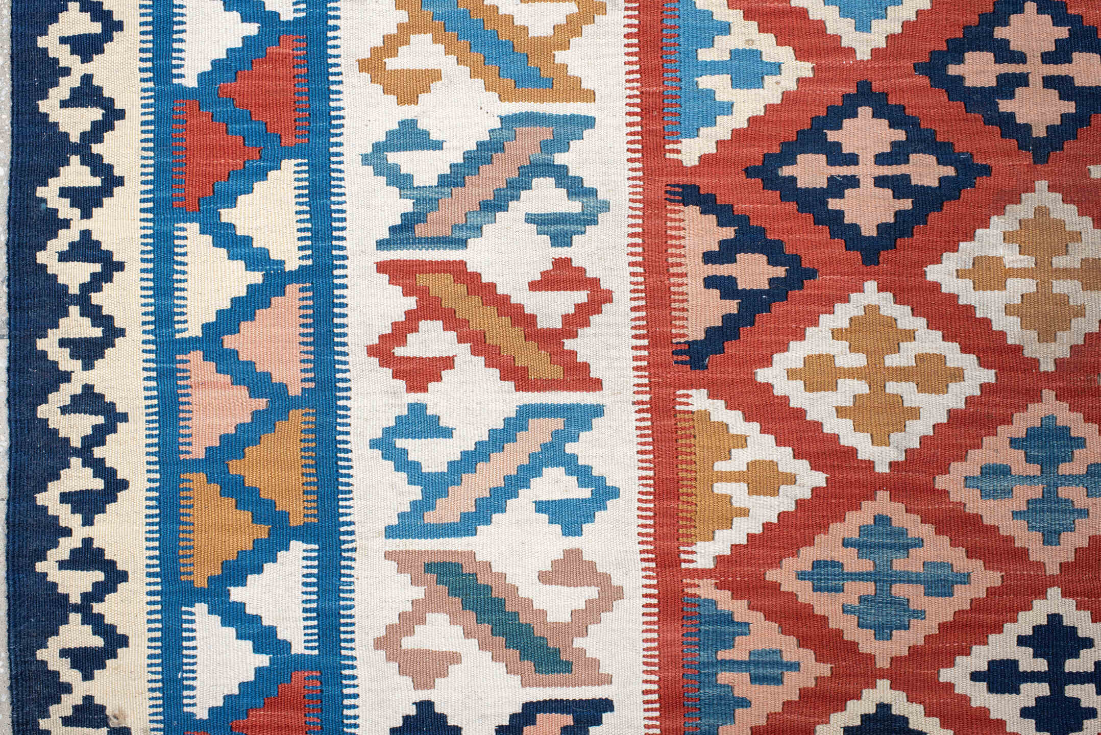 9' x 13' one-of-a-kind handmade vintage Kilim large size rug. Color palette: terracotta, ivory, navy, sky_blue, gold, teal