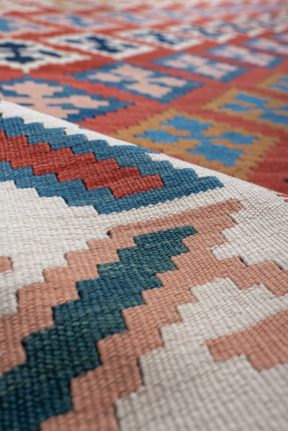 9' x 13' one-of-a-kind handmade vintage Kilim large size rug. Color palette: terracotta, ivory, navy, sky_blue, gold, teal