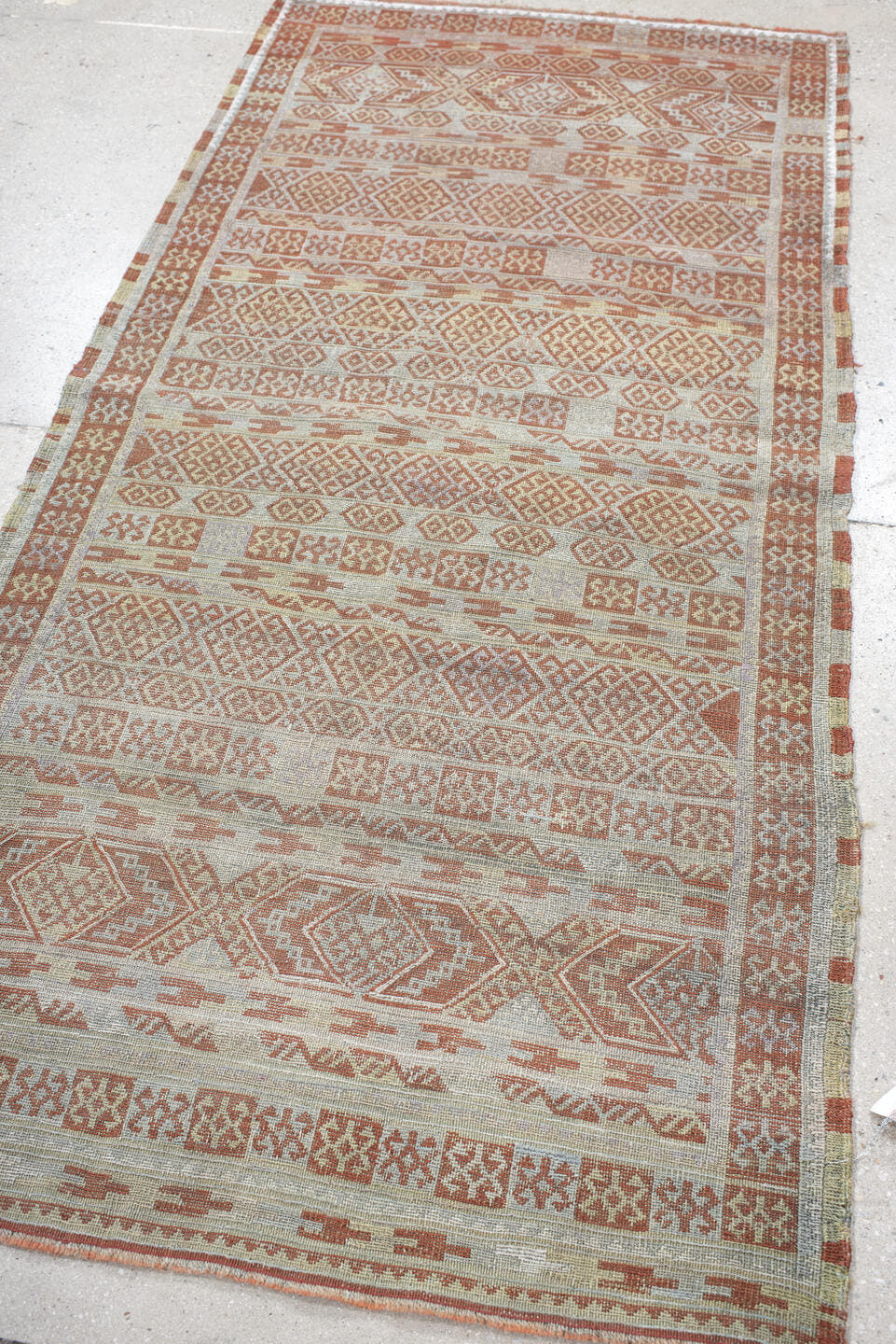 3' x 6' one-of-a-kind handmade antique Sumak runner rug. Color palette: ivory, terra cotta, camel, taupe, terracotta, brown