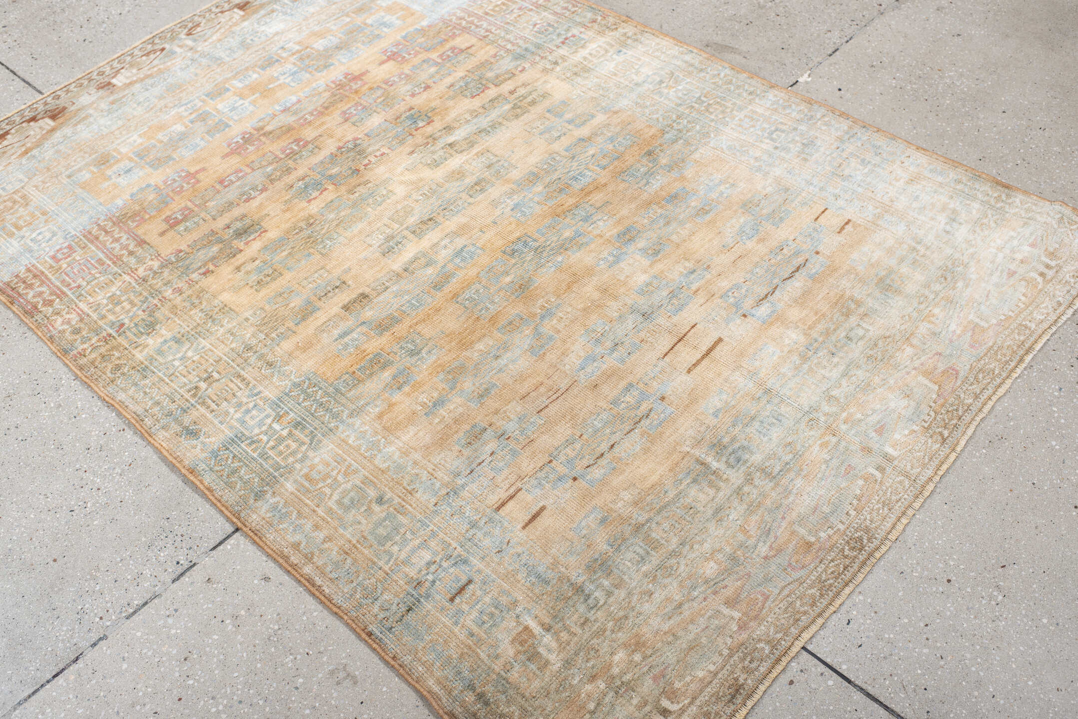 4' x 5' one-of-a-kind handmade antique Yamoud small size rug. Color palette: ivory, pale blue, camel, soft rust, taupe