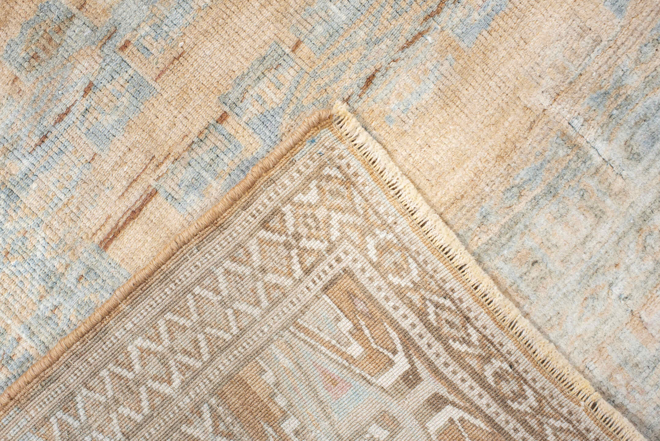 4' x 5' one-of-a-kind handmade antique Yamoud small size rug. Color palette: ivory, pale blue, camel, soft rust, taupe