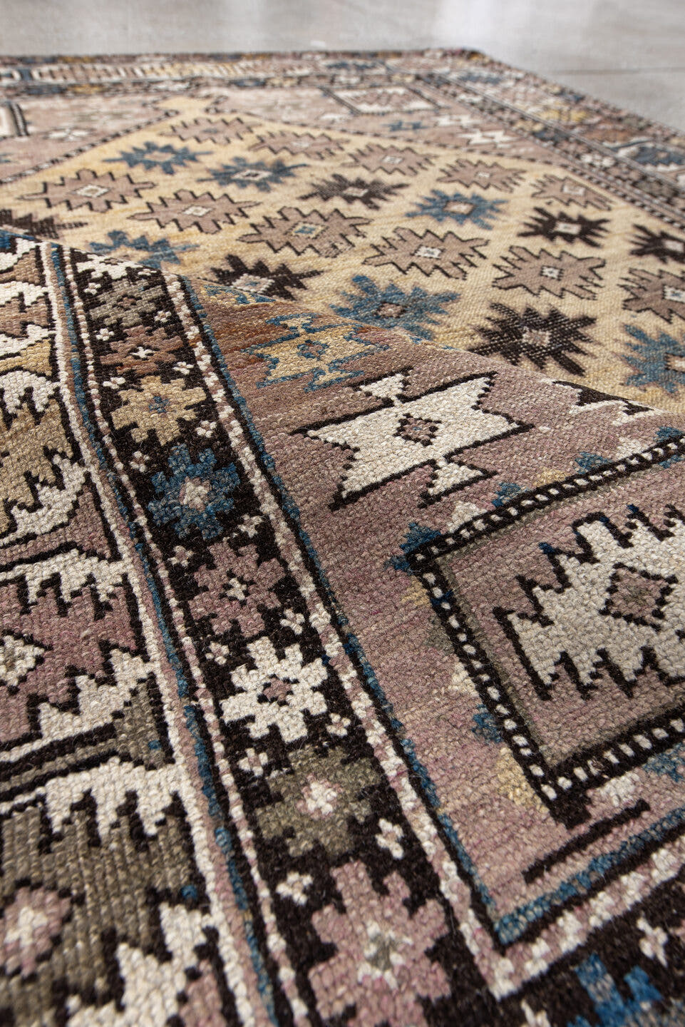 4' x 4' one-of-a-kind handmade antique Shirvan small size rug. Color palette: ivory, taupe, indigo, brown, slate, camel