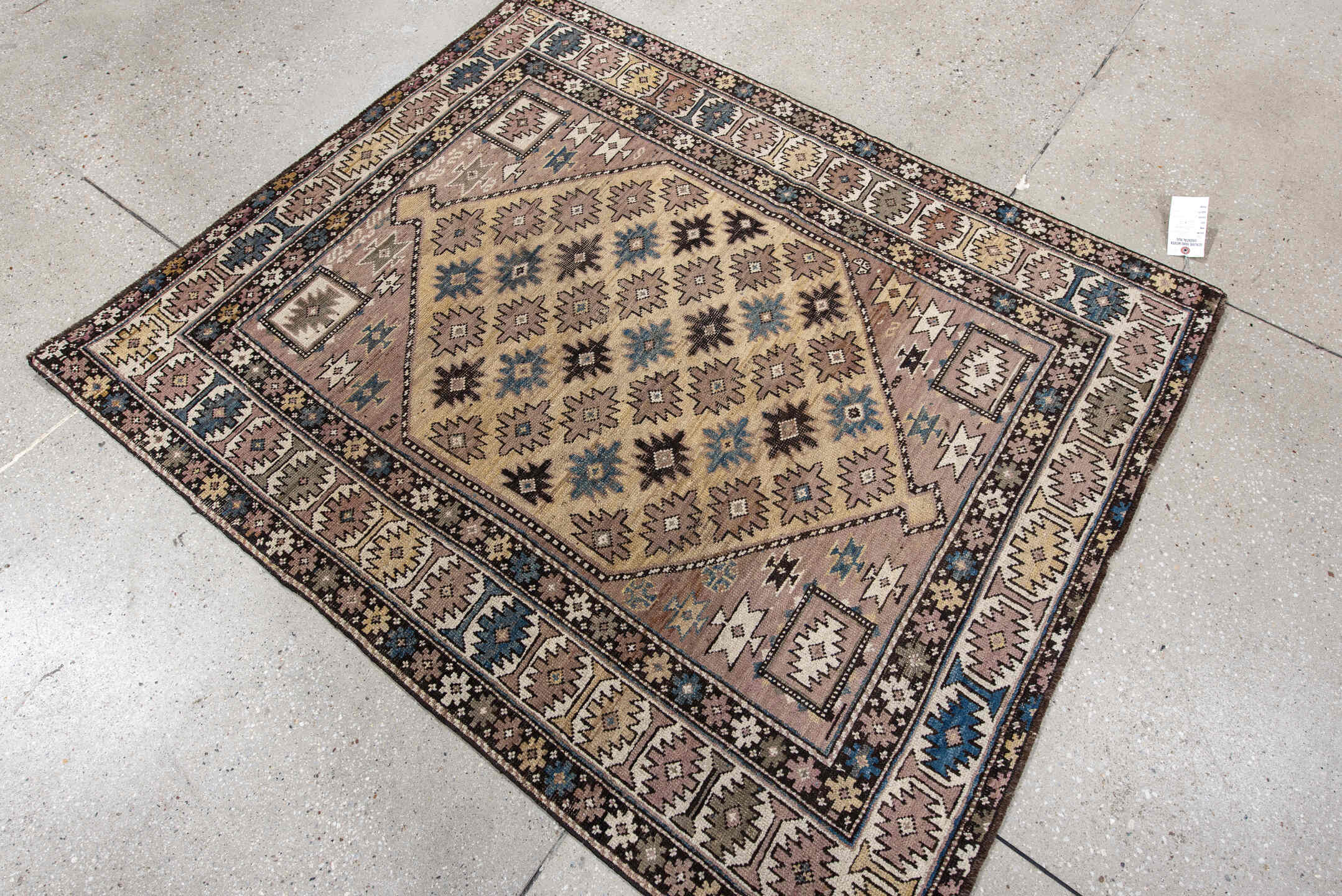 4' x 4' one-of-a-kind handmade antique Shirvan small size rug. Color palette: ivory, taupe, indigo, brown, slate, camel