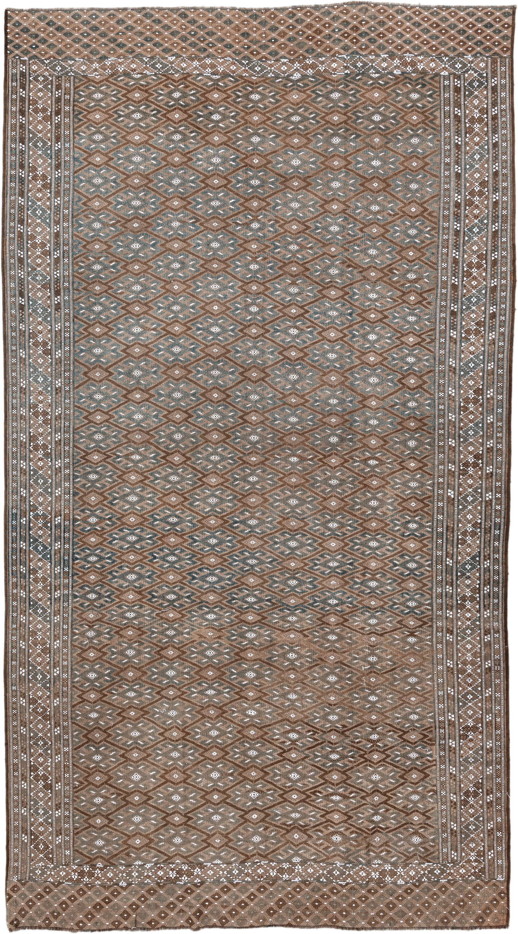 7' x 12' one-of-a-kind handmade antique Kilim large size rug. Color palette: taupe, brown, ivory, slate, camel, beige, gray