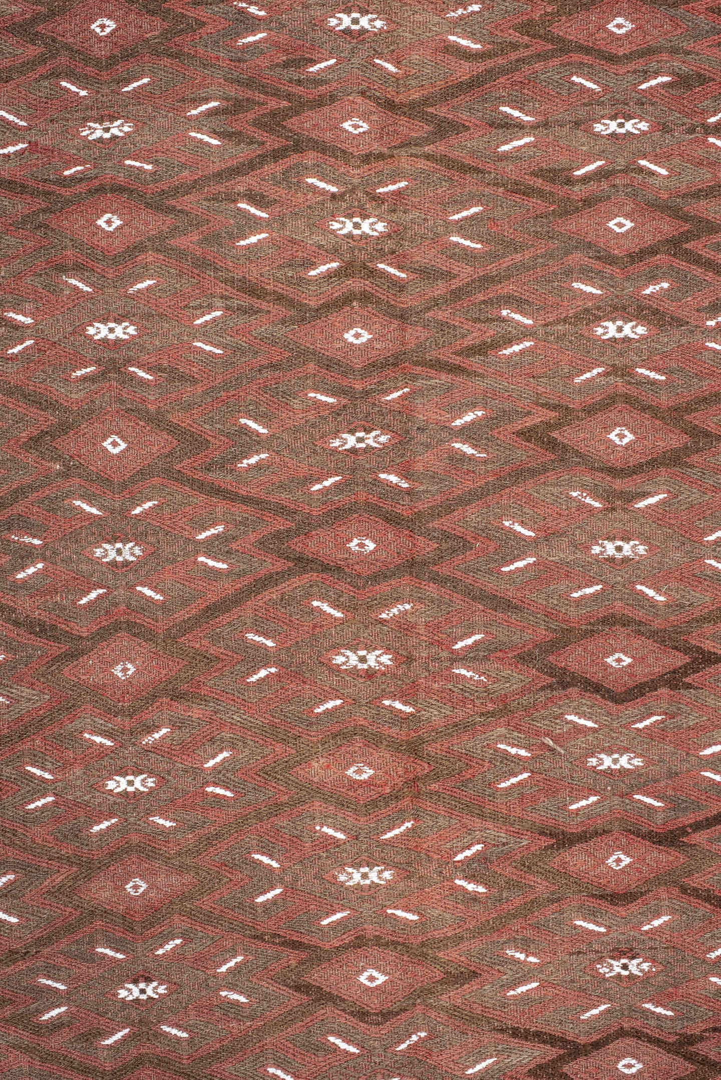 7' x 12' one-of-a-kind handmade antique Kilim large size rug. Color palette: rust, brown, ivory, terra cotta, taupe