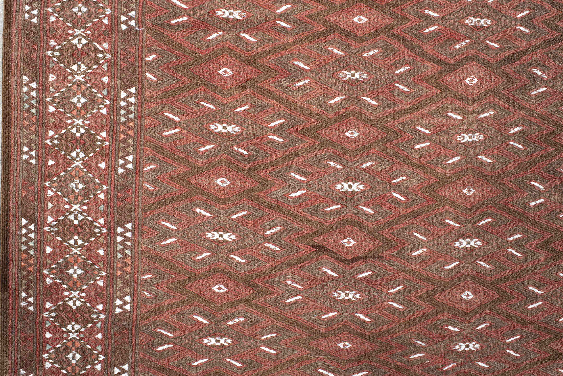 7' x 12' one-of-a-kind handmade antique Kilim large size rug. Color palette: rust, brown, ivory, terra cotta, taupe