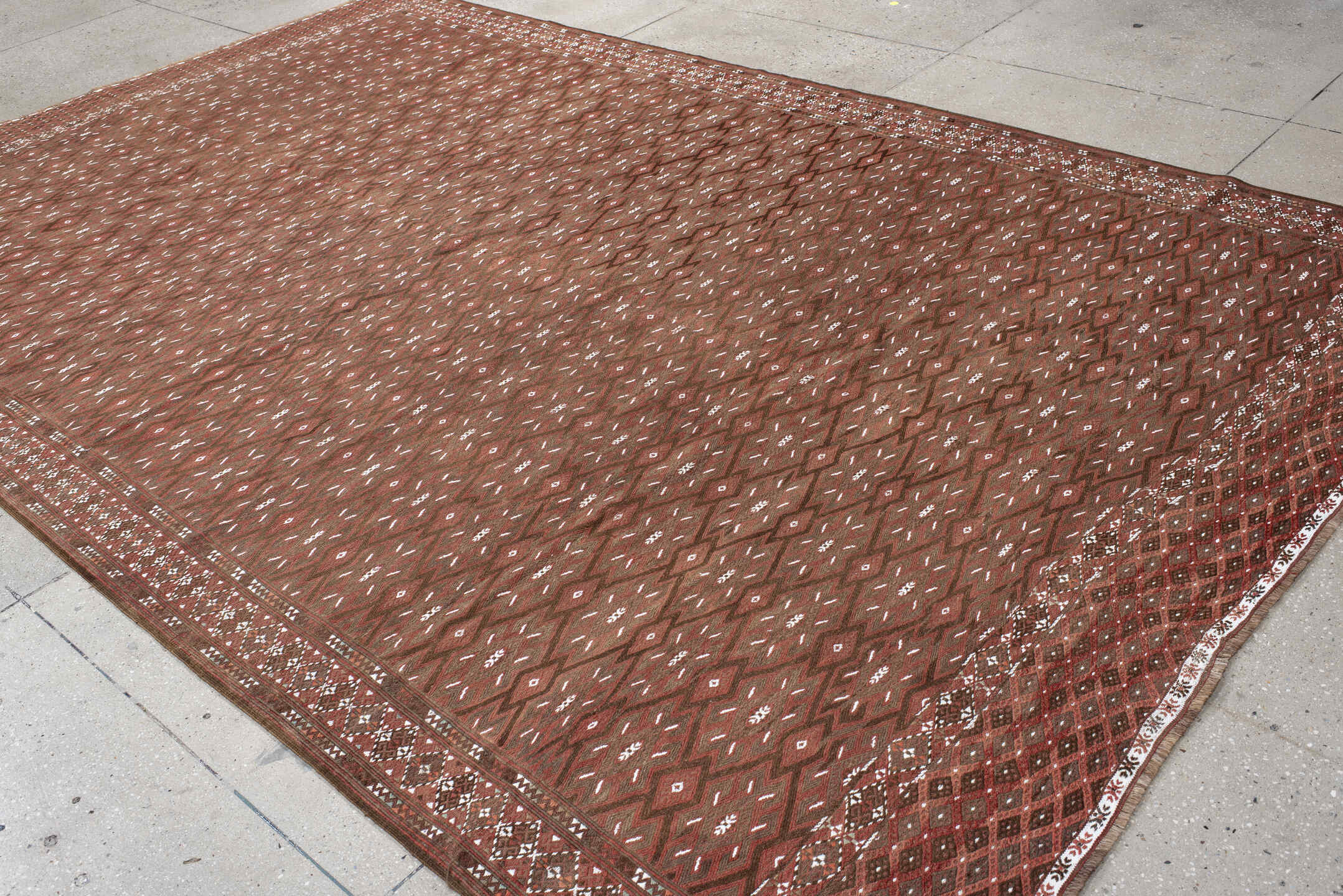 7' x 12' one-of-a-kind handmade antique Kilim large size rug. Color palette: rust, brown, ivory, terra cotta, taupe