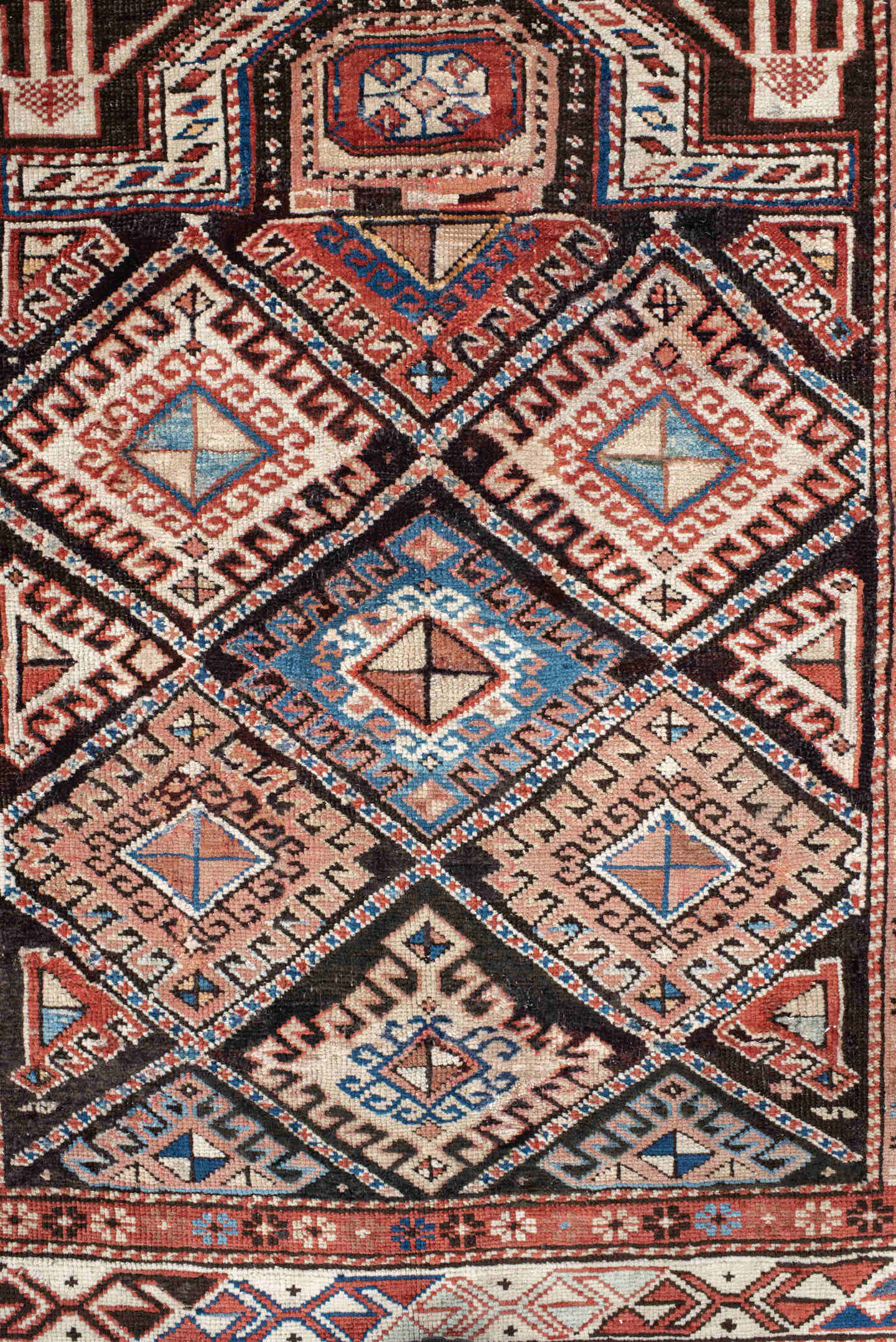 2' x 3' one-of-a-kind handmade antique Shirvan small size rug. Color palette: ivory, rust, brown, sky blue, navy, black