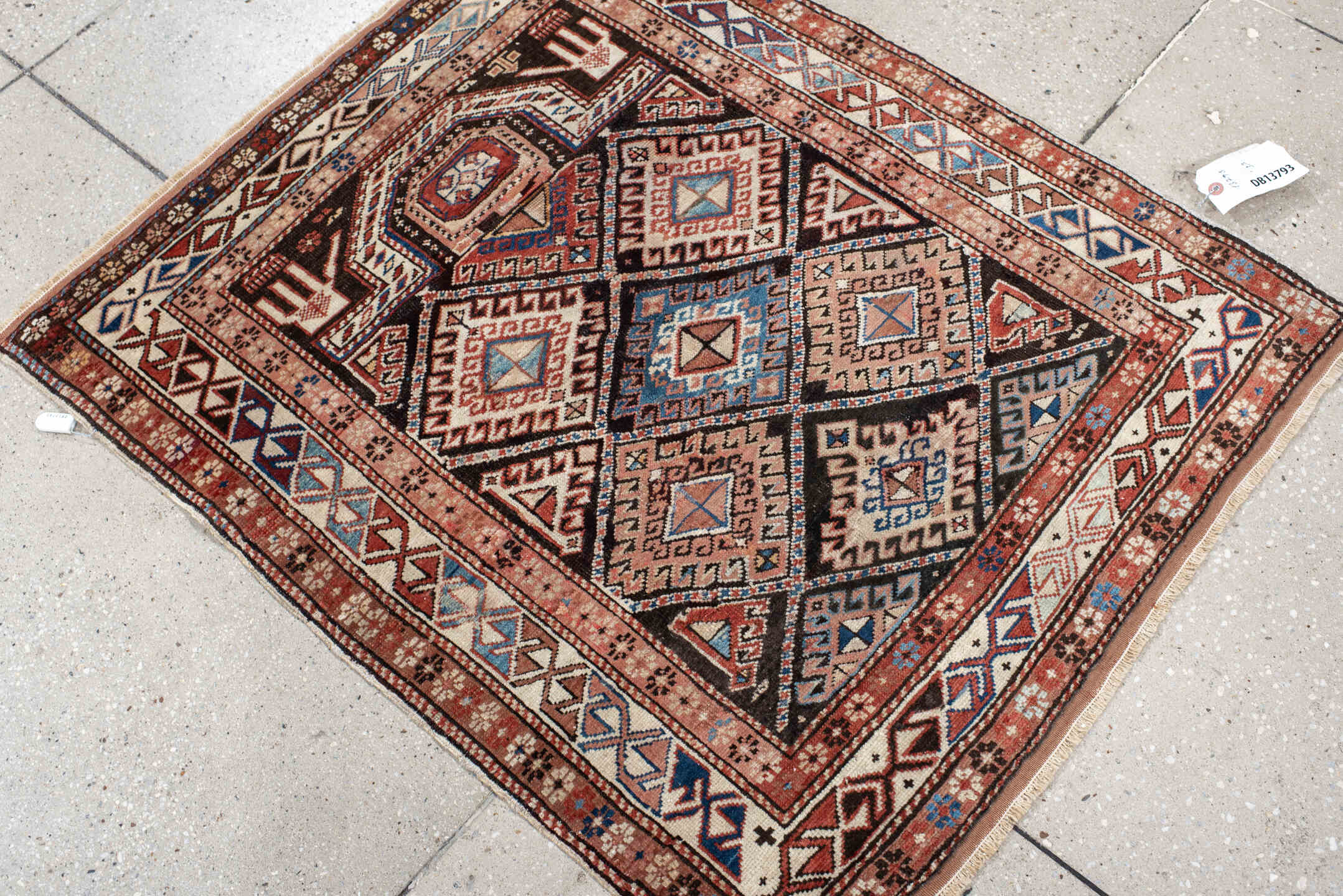2' x 3' one-of-a-kind handmade antique Shirvan small size rug. Color palette: ivory, rust, brown, sky blue, navy, black