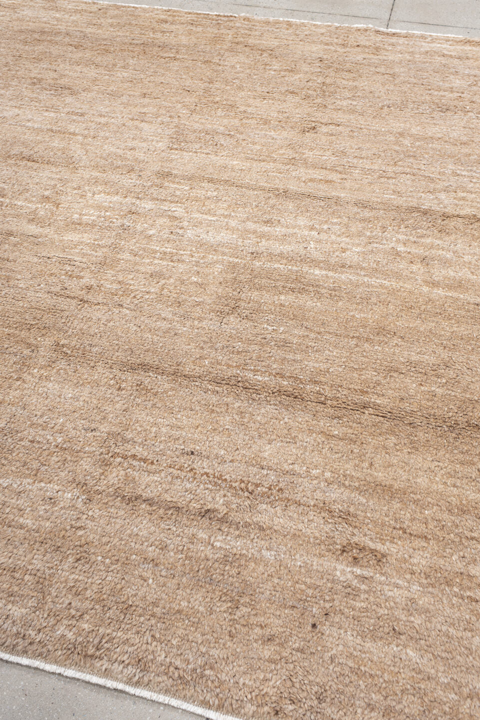 8' x 9' one-of-a-kind handmade vintage India rug. Color palette: tan, camel, taupe, beige, cream, gray, ivory