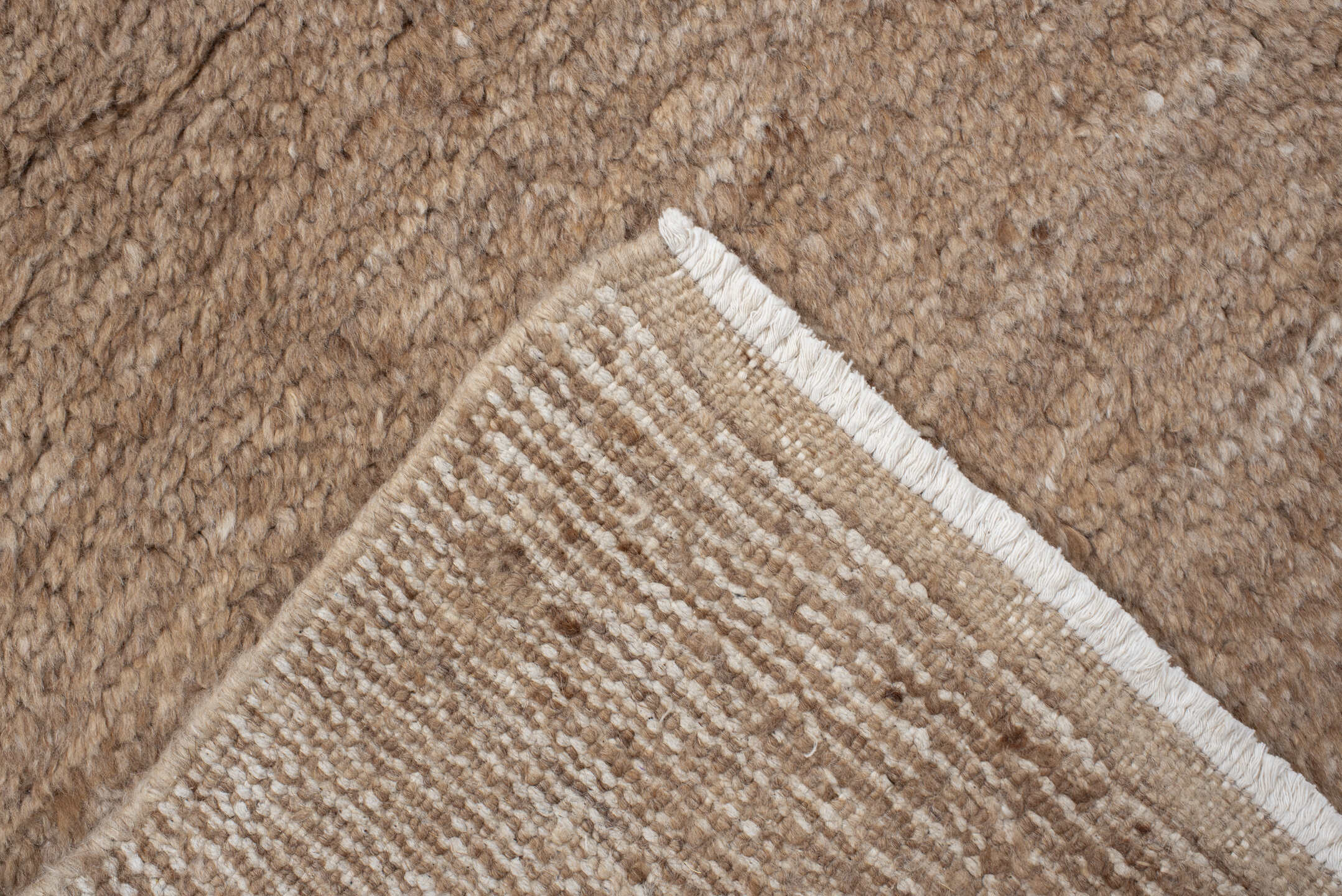 8' x 9' one-of-a-kind handmade vintage India rug. Color palette: tan, camel, taupe, beige, cream, gray, ivory
