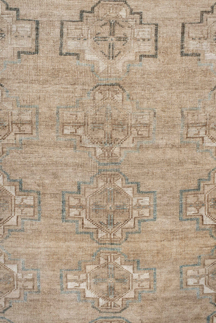 7' x 9' one-of-a-kind handmade antique Afghan rug. Color palette: ivory, taupe, pale blue, beige, camel, light brown, gray