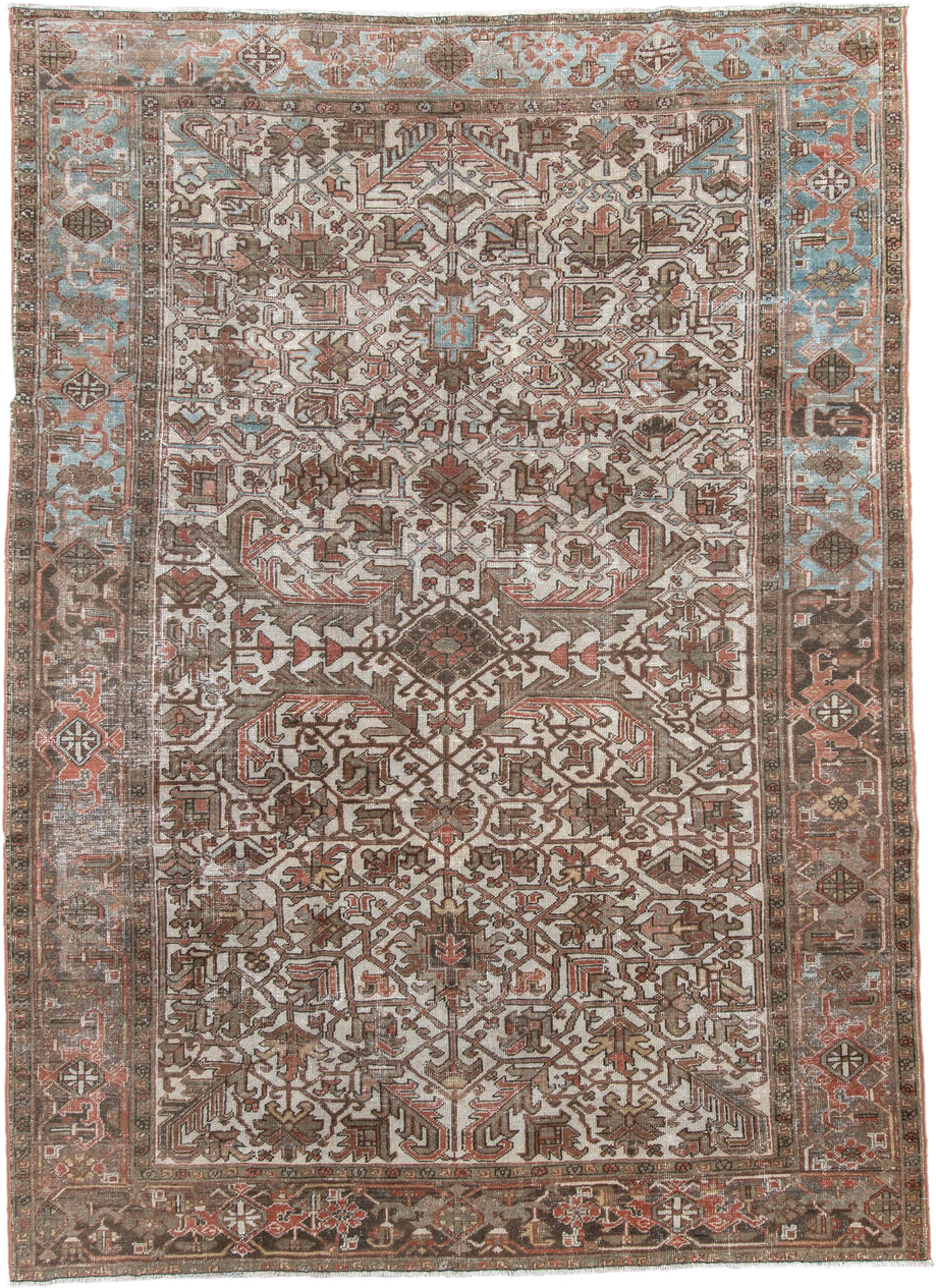 6' x 9' one-of-a-kind handmade antique Heriz medium size rug. Color palette: ivory, brown, sky_blue, rust, taupe, charcoal