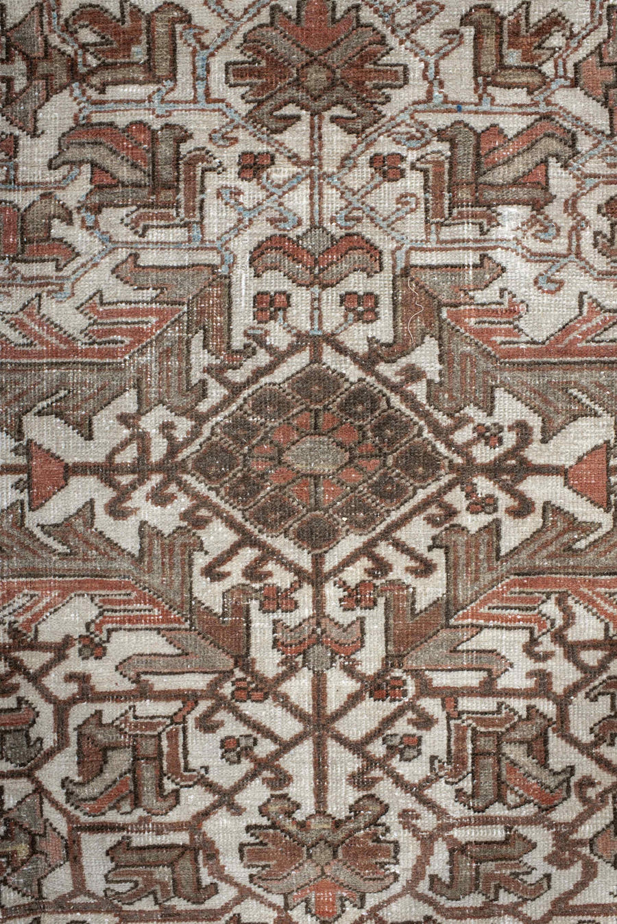 6' x 9' one-of-a-kind handmade antique Heriz medium size rug. Color palette: ivory, brown, sky_blue, rust, taupe, charcoal