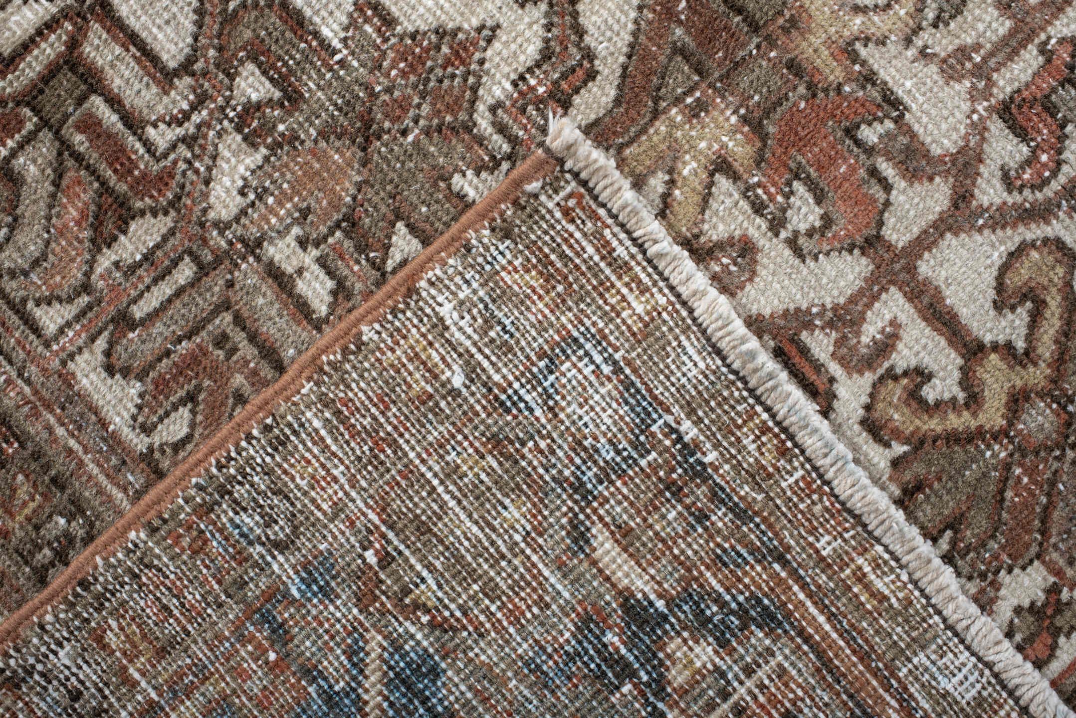 6' x 9' one-of-a-kind handmade antique Heriz medium size rug. Color palette: ivory, brown, sky_blue, rust, taupe, charcoal