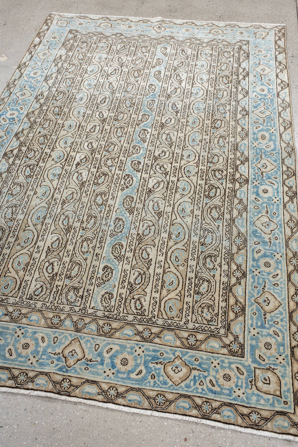 4' x 7' one-of-a-kind handmade antique Qum rug. Color palette: ivory, sky blue, taupe, brown, light blue, beige, gray