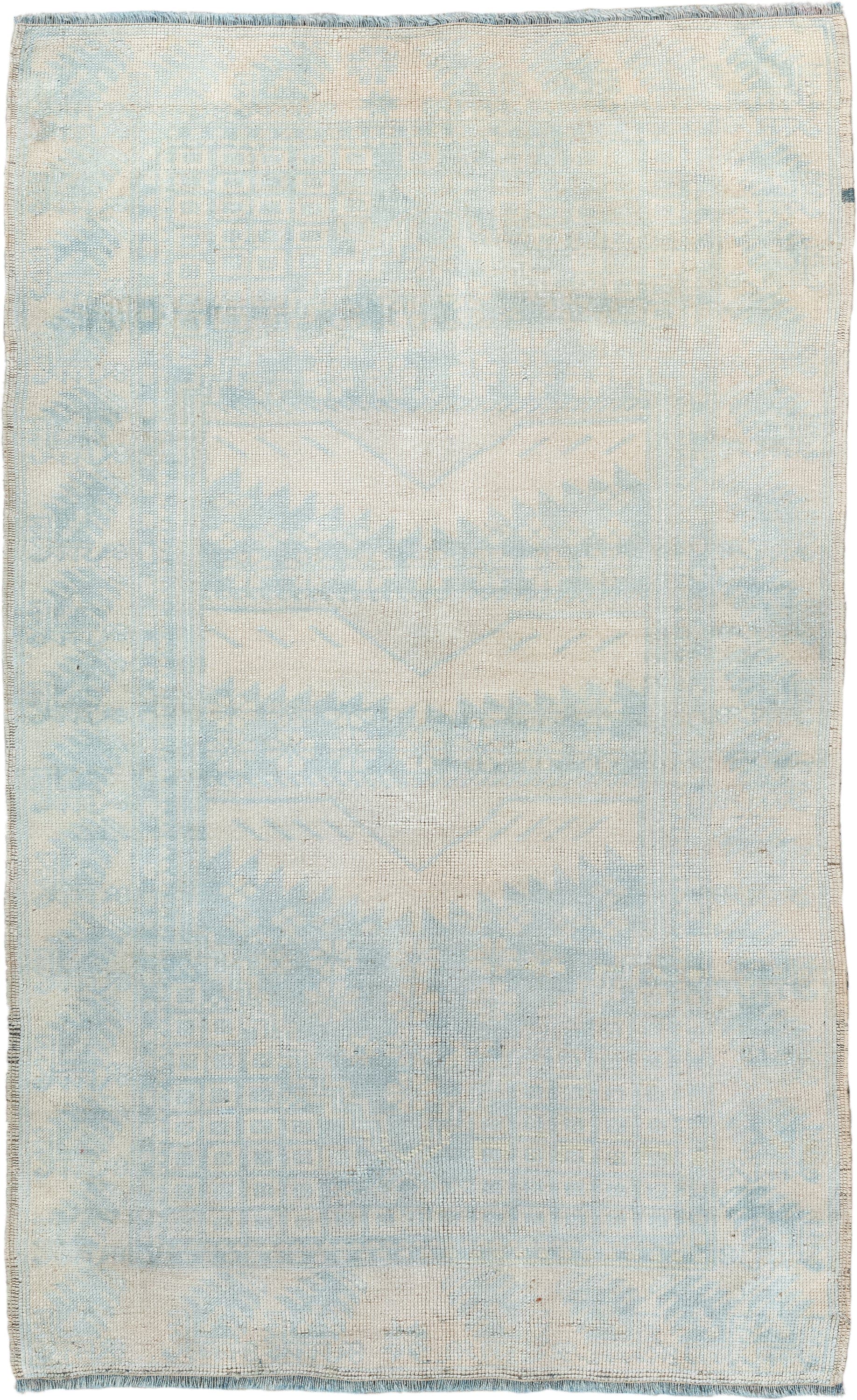 2' x 4' one-of-a-kind handmade vintage Anatolian small size rug. Color palette: ivory, pale blue, cream, sky blue
