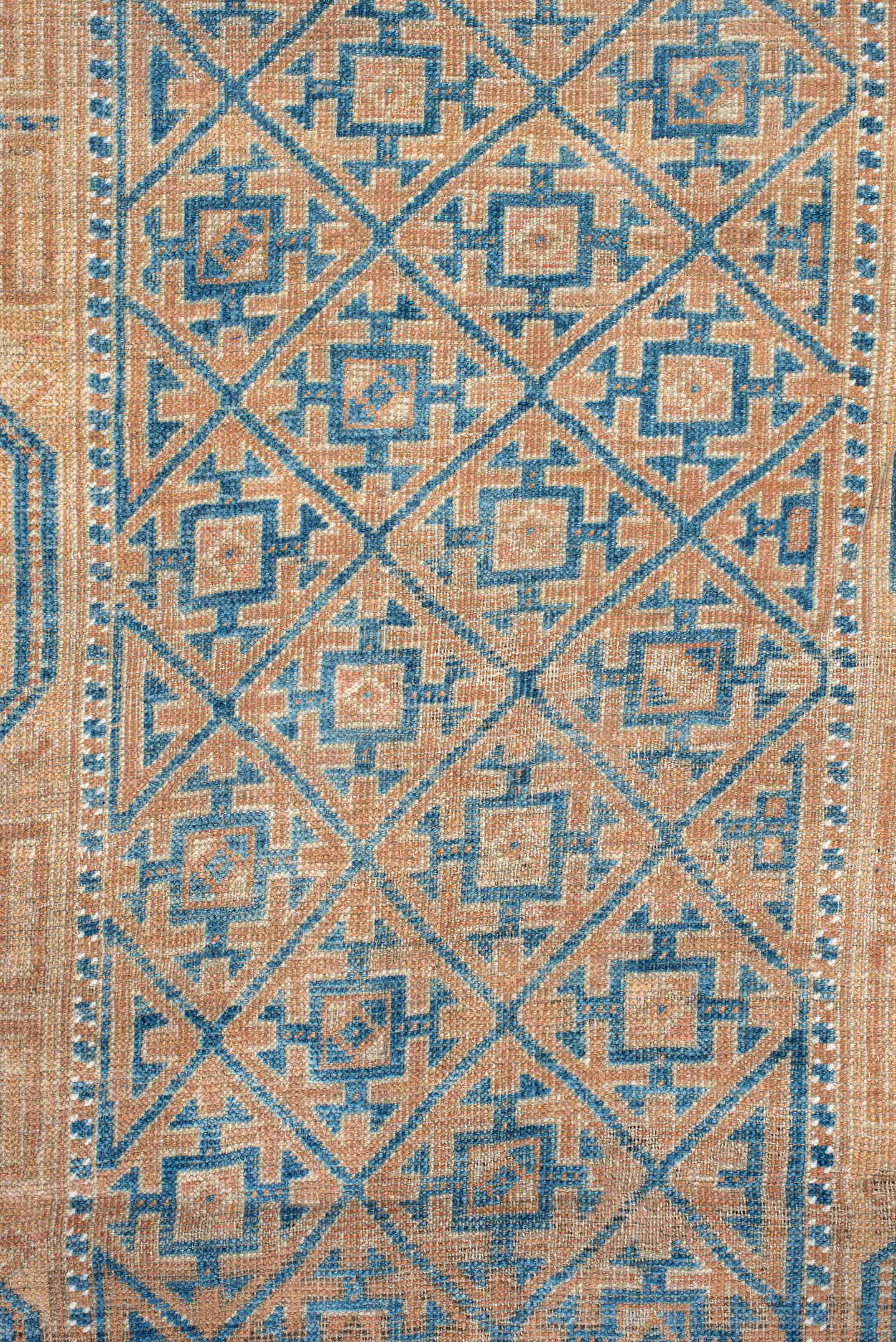2' x 4' one-of-a-kind handmade antique Belouch small size rug. Color palette: peach, ivory, sky blue, camel, taupe