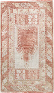 2' x 4' one-of-a-kind handmade antique Anatolian small size rug. Color palette: ivory, terra cotta, sand, blush, camel