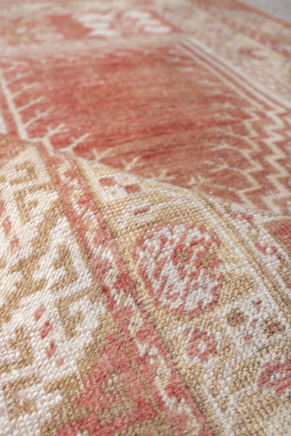 2' x 4' one-of-a-kind handmade antique Anatolian small size rug. Color palette: ivory, terra cotta, sand, blush, camel